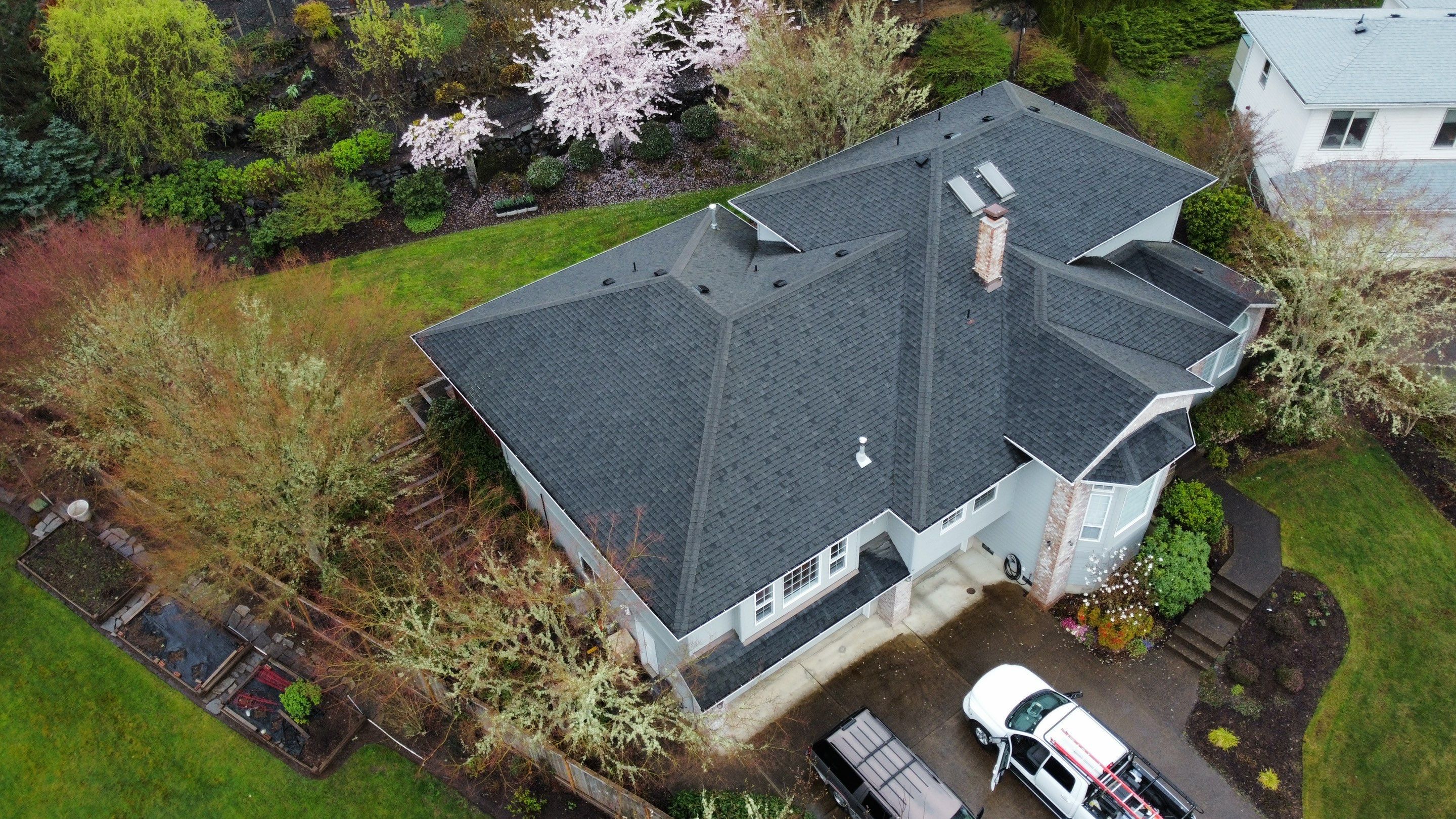 Residential Roofing Installation using IKO Dynasty (Color: Granite Black) by Orezona Building & Roofing Company, Inc.