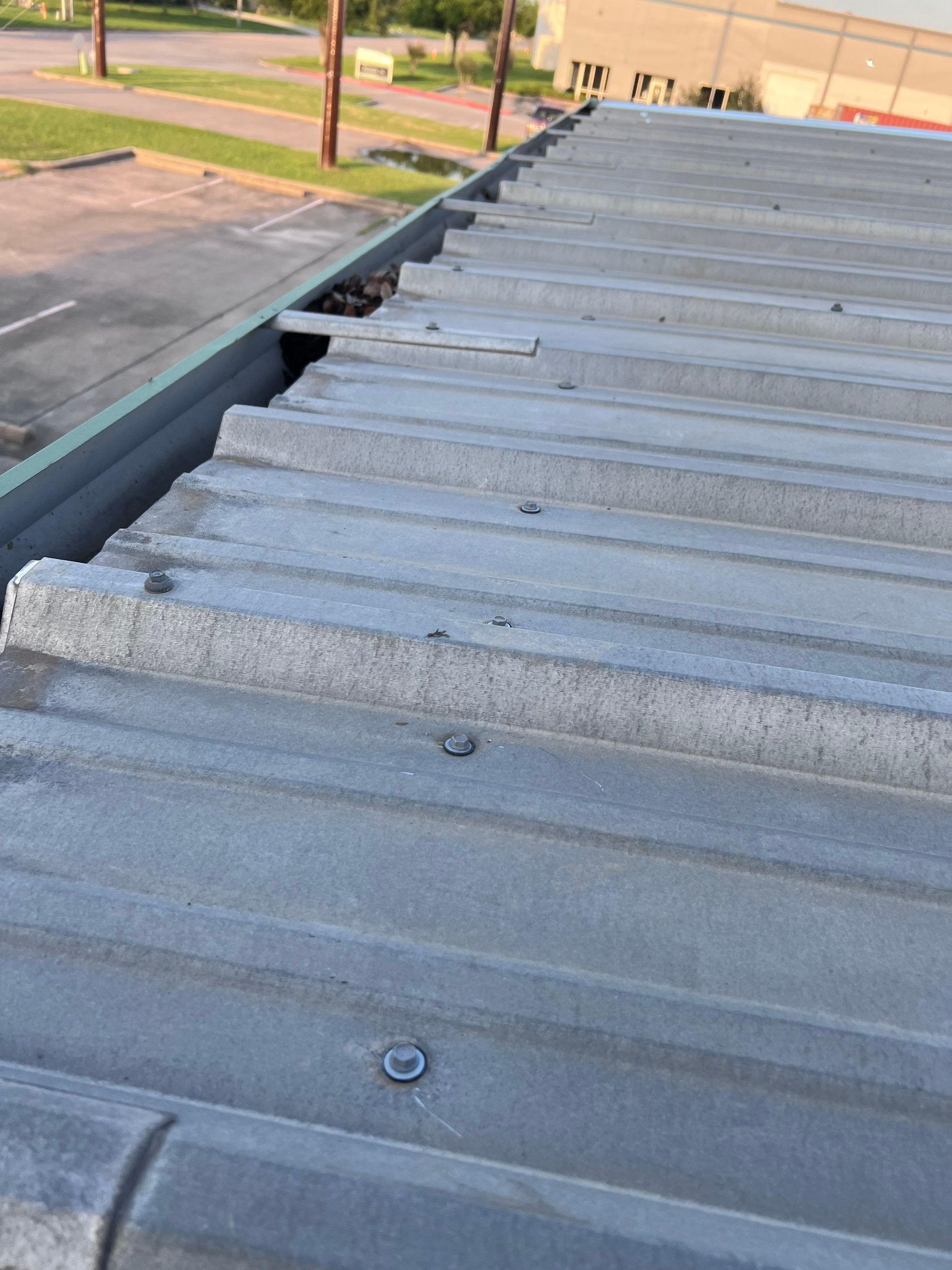 Hail Damage using Metal by Roof Repair Company