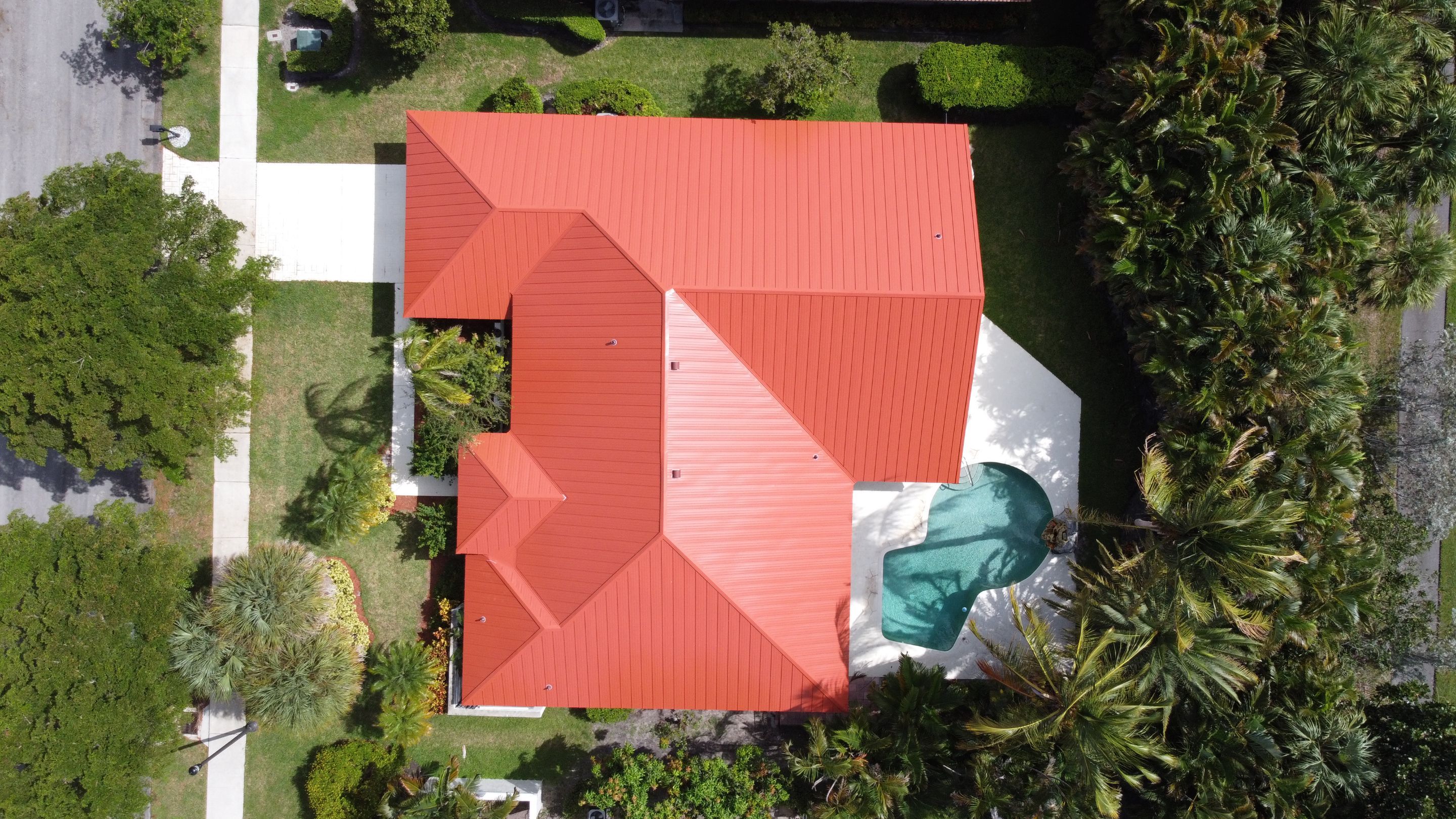 Residential Roofing Installation using 1" Nail strip metal roof by BLUES BROTHERS CONSTRUCTION CORP