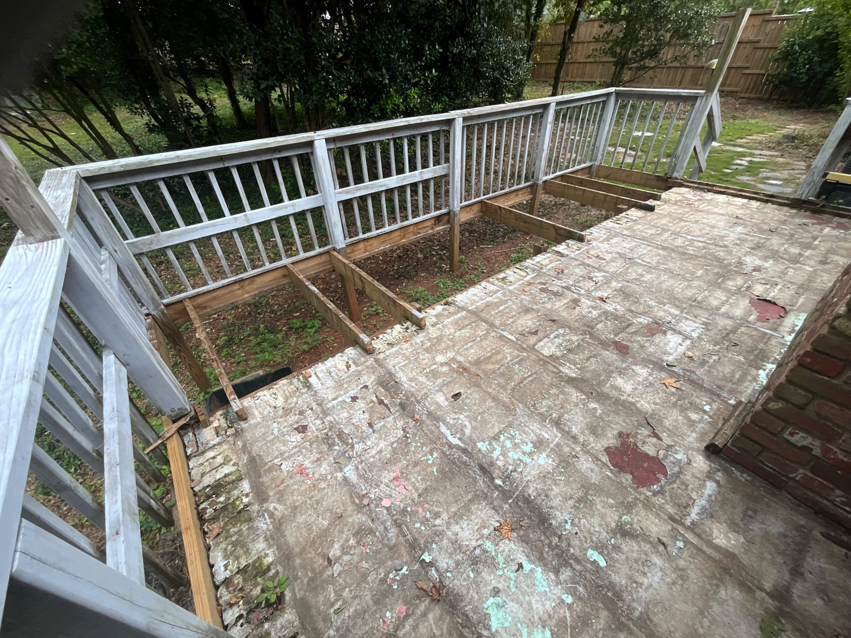 Pressure-Treated Wood Deck Replacement and Railing Installation in Marietta by Swift Home Renovations 