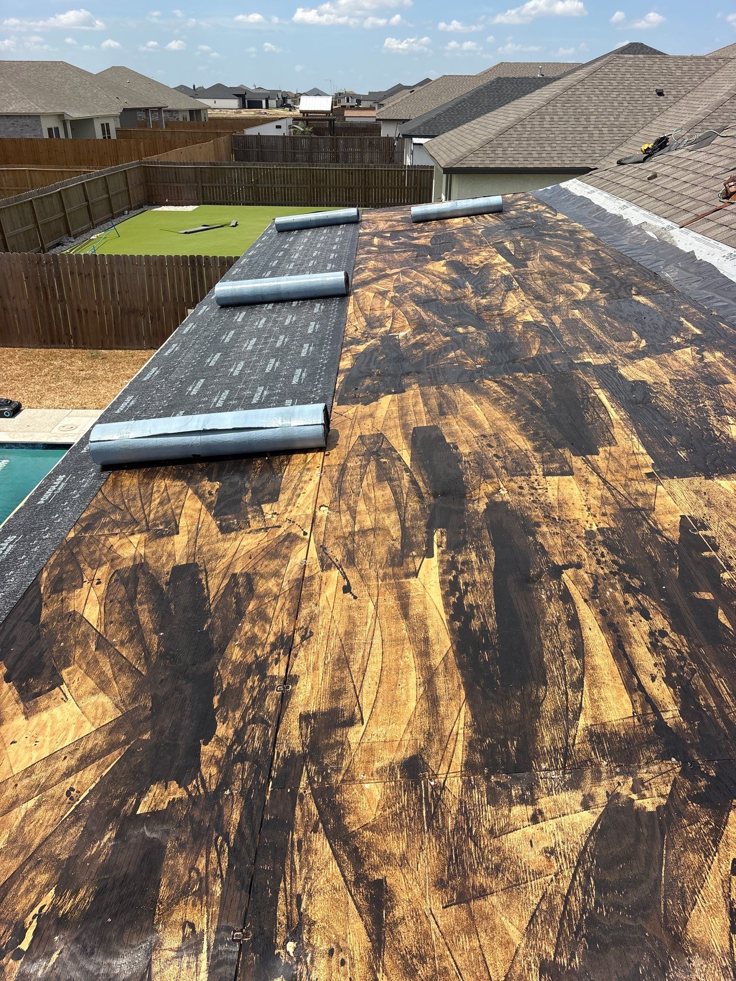 Patio Pool Cover by Bayfront Roofing and Construction