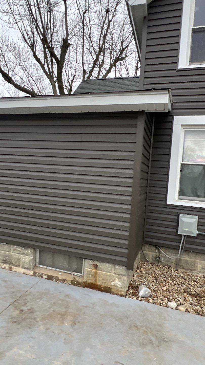 Residential fascia replacement using Exterior Portfolio 4.5 DL - Peppercorn by Nitro Roofing and Construction
