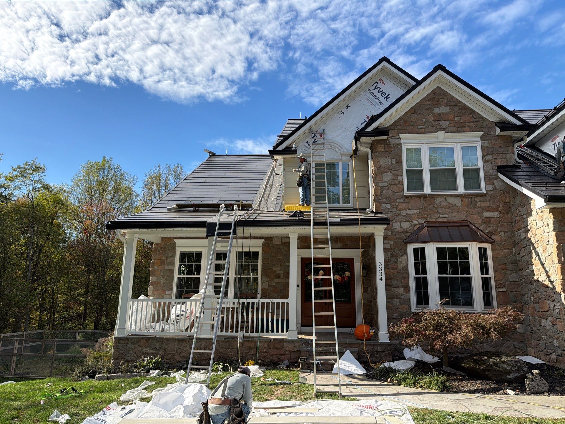 Beautiful James Hardie Siding & Tesla Solar Roof by American Home Contractors