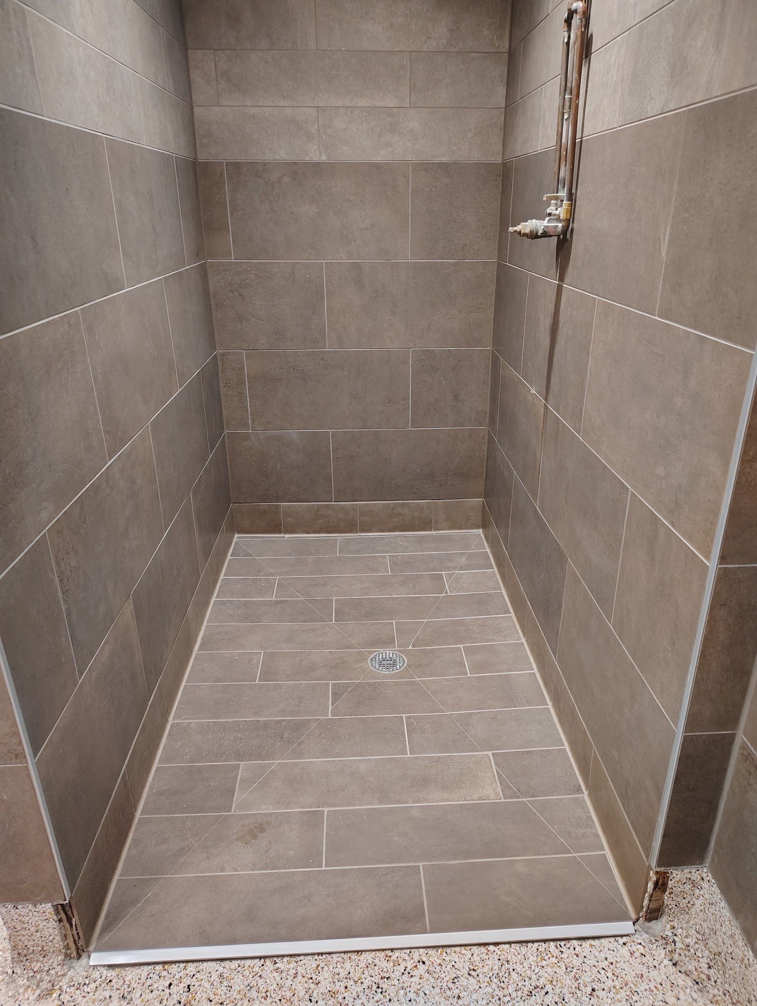 Trucking company showers by Footprints Floors of Nashville