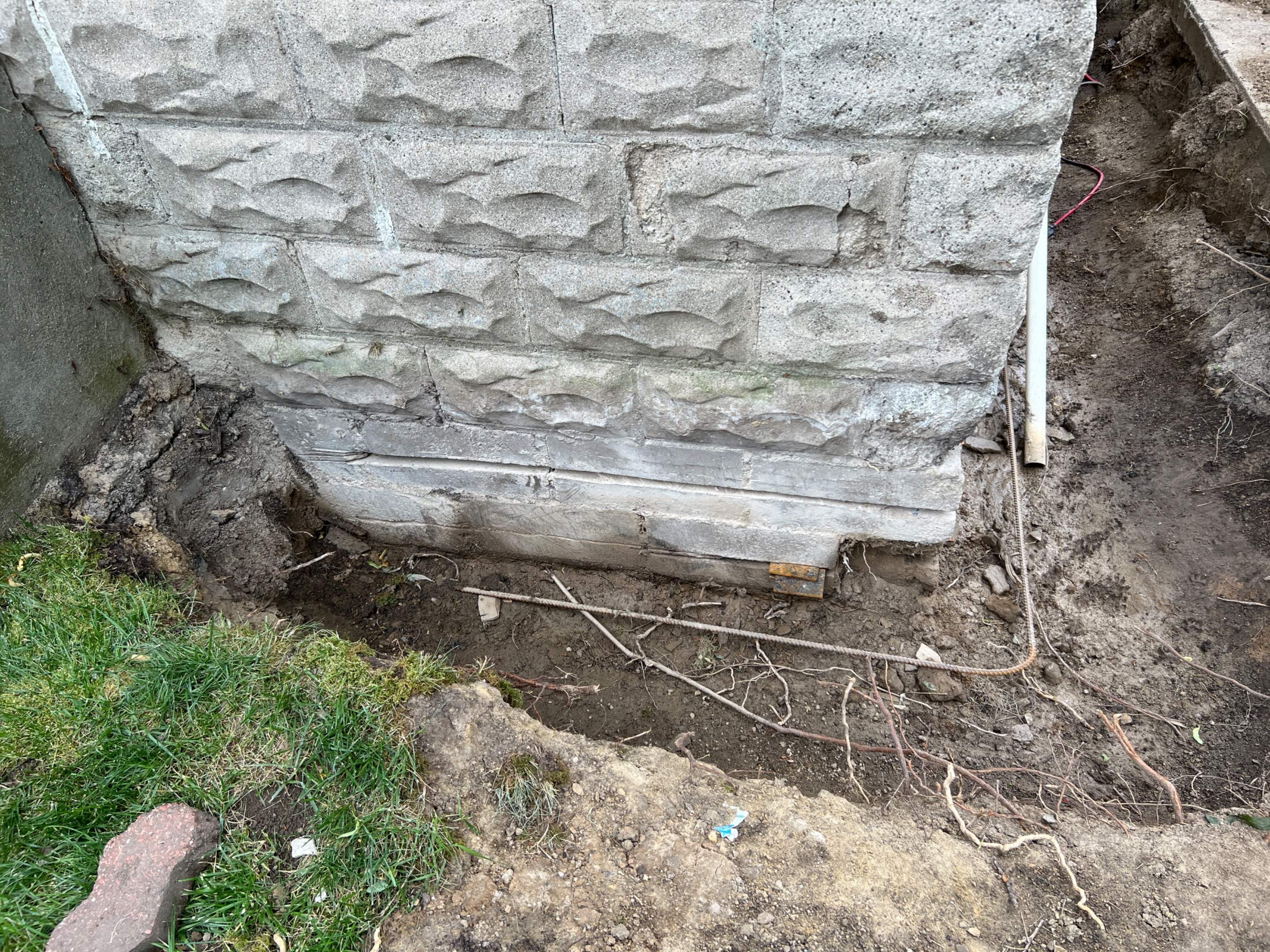 Helical Piers using Helical Deep Foundation Footings by Toledo Basement Repair