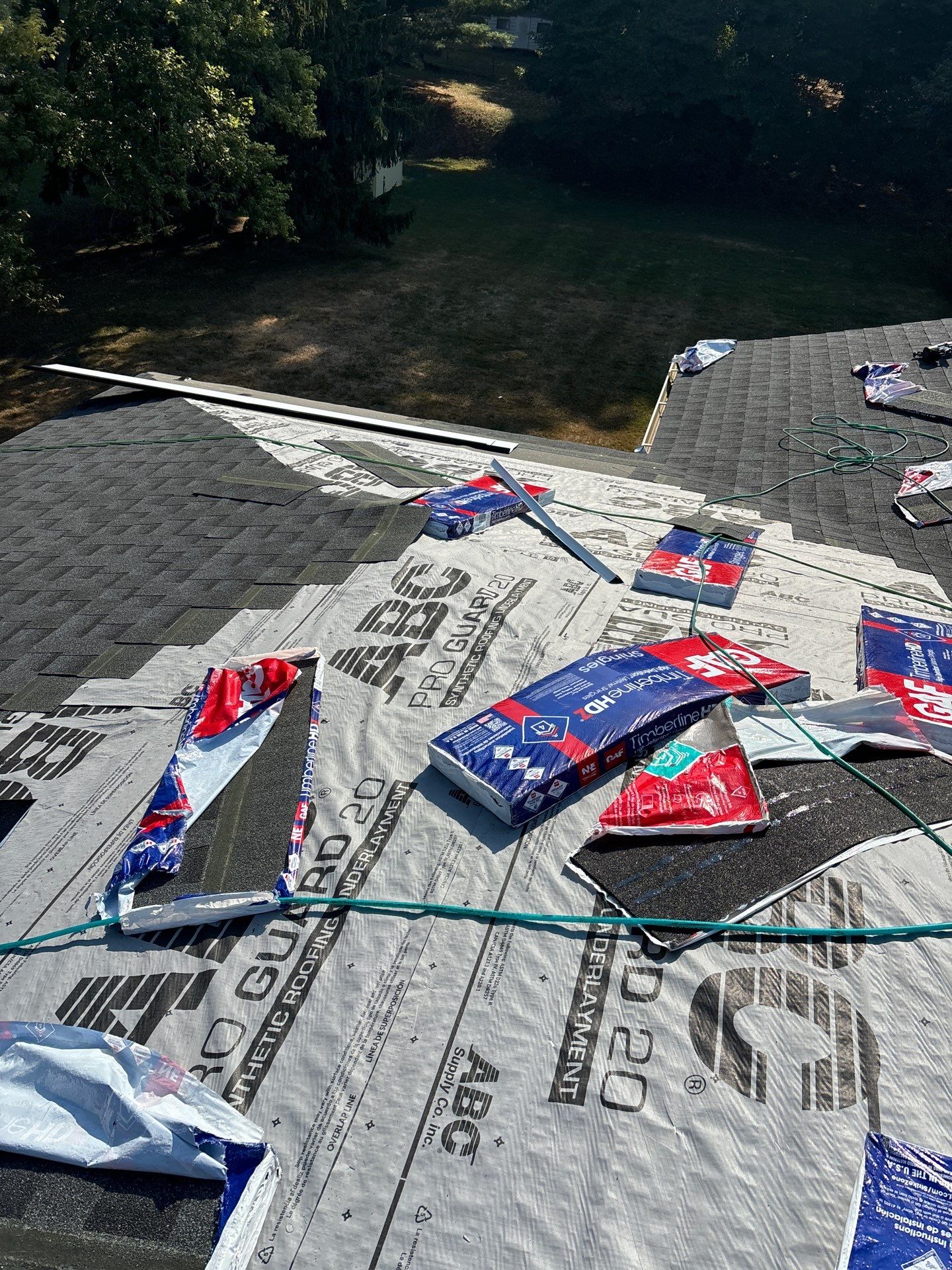 Residential Roofing Installation using GAF Timberline HDZ Charcoal by Rainstoppers Roofing