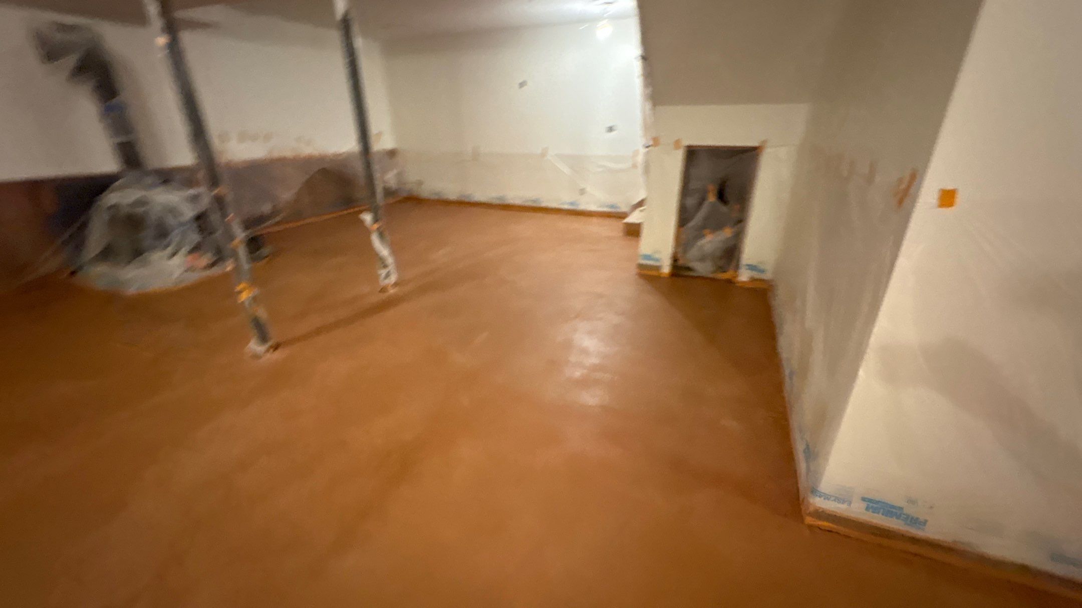 Basement Floor Remodel with Haven Reno KC by Big Red Decorative Concrete, LLC