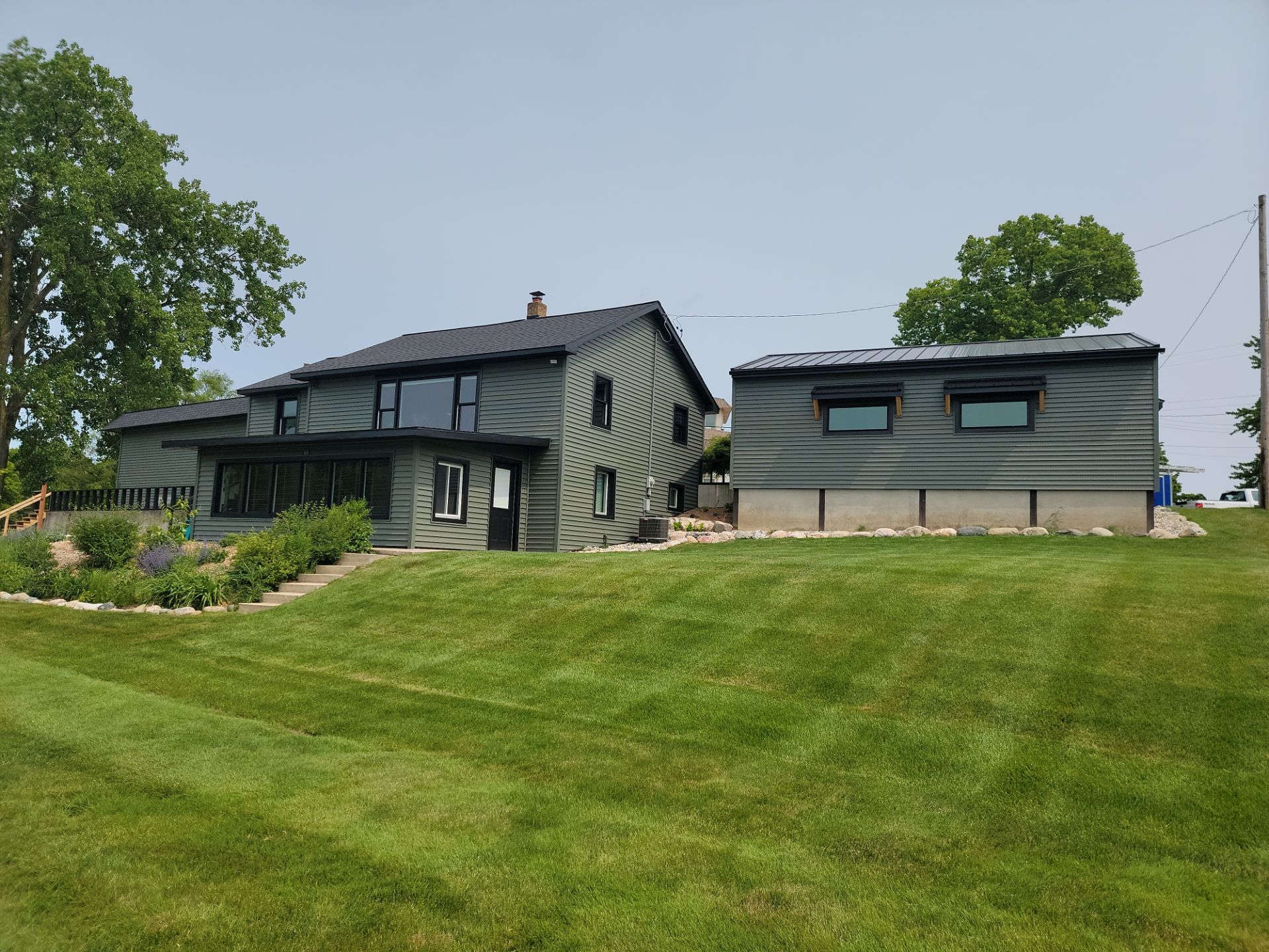 ROOF, SIDING AND SOFFIT INSTALLATION by Avalon Roofing and Exteriors