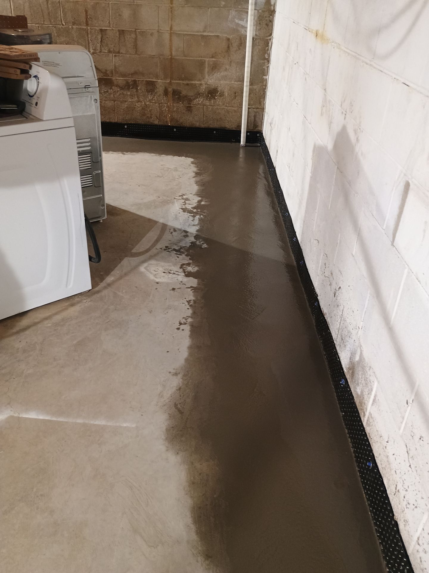 Interior Drain Tile Installation near Columbia Heights, MN by Waterproofing Northeast