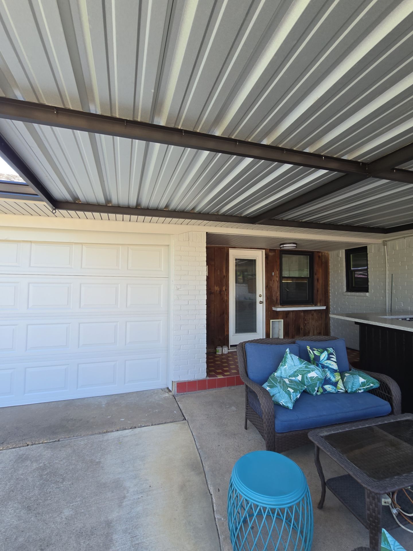 Exterior Home Paint Project with Different Surfaces by SLM General Contractors & Roofing