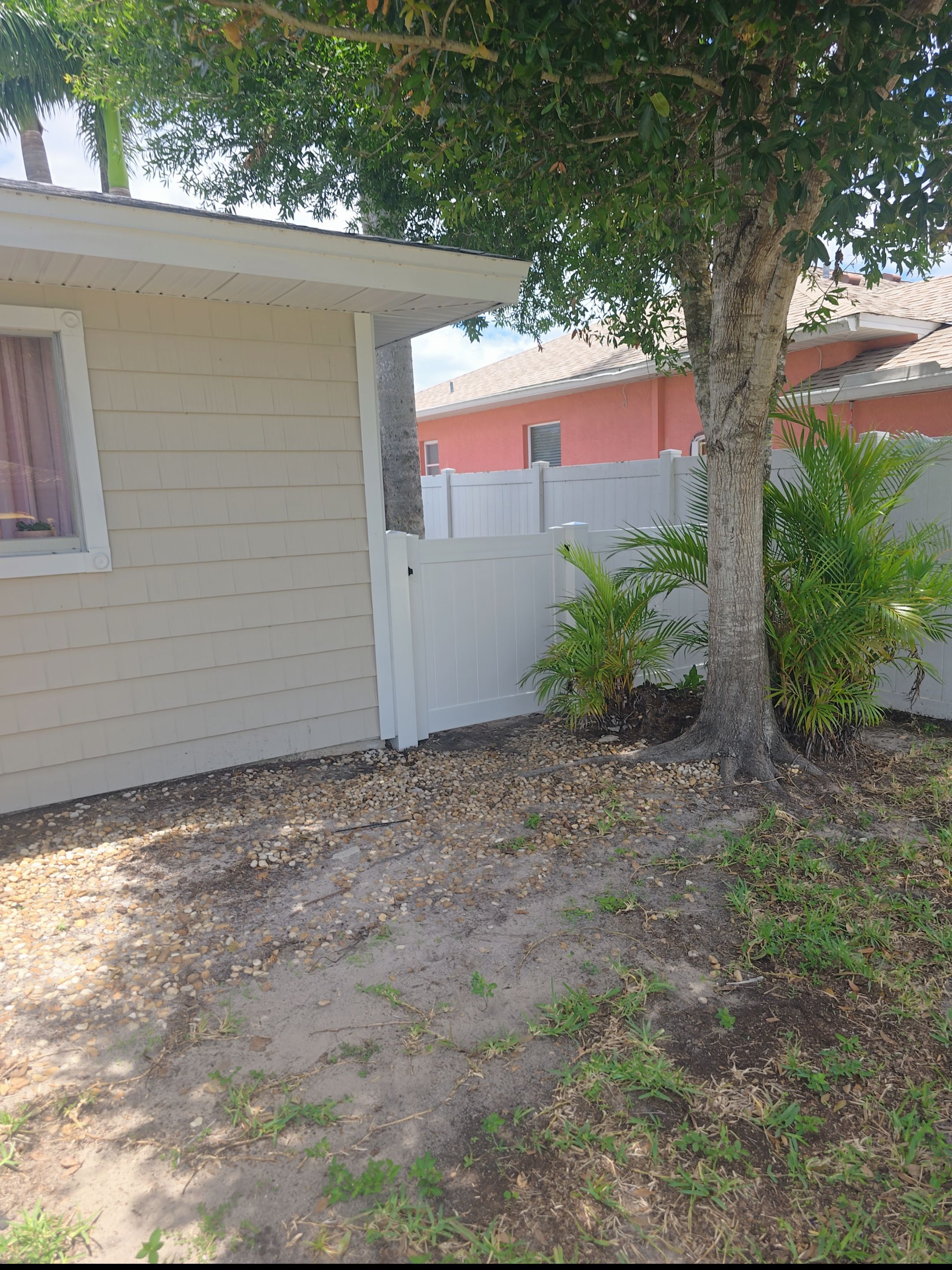 White Vinyl Privacy Fence Installation in Bonita Springs by True Fence LLC
