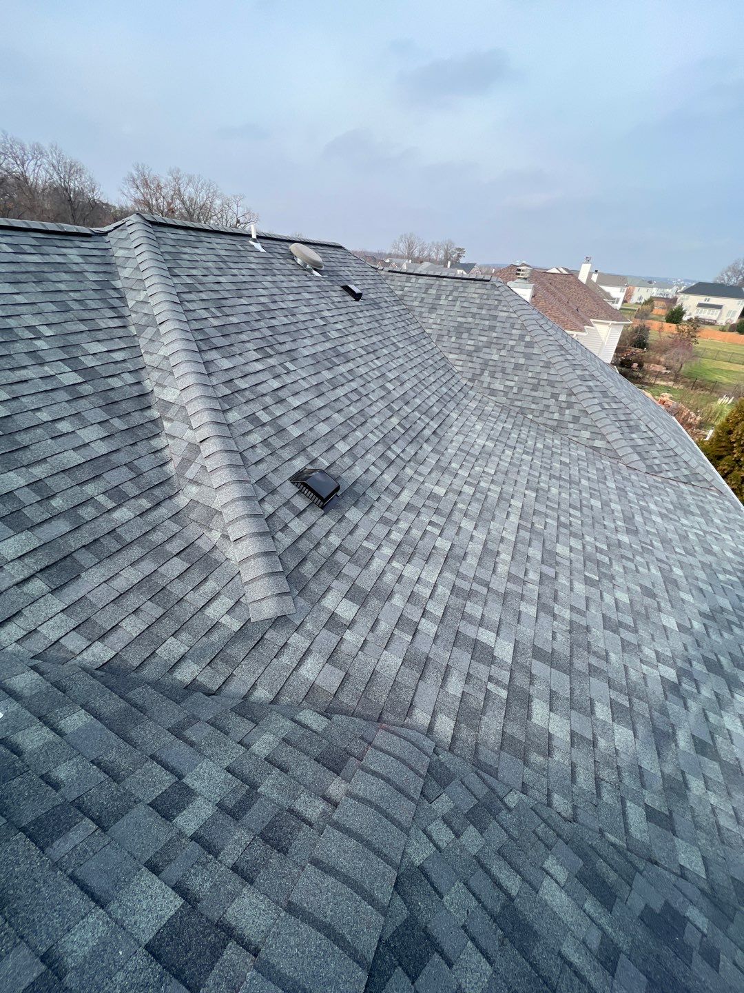 Estate Gray Shingles by Reimagine Roofing