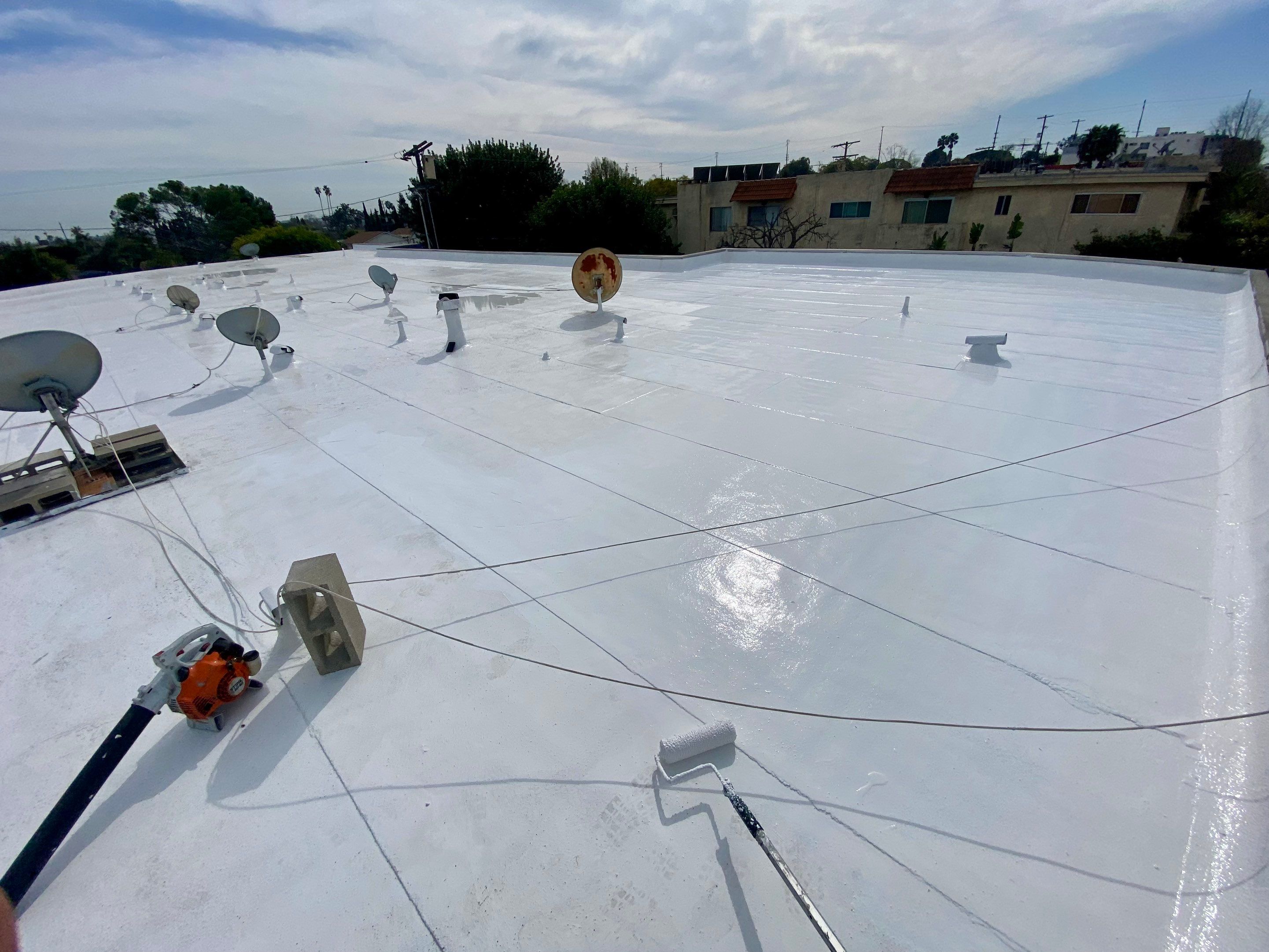 Apartment Building - Silicone Installation using ASC's Silicone Membrane by Hull Brothers Roofing