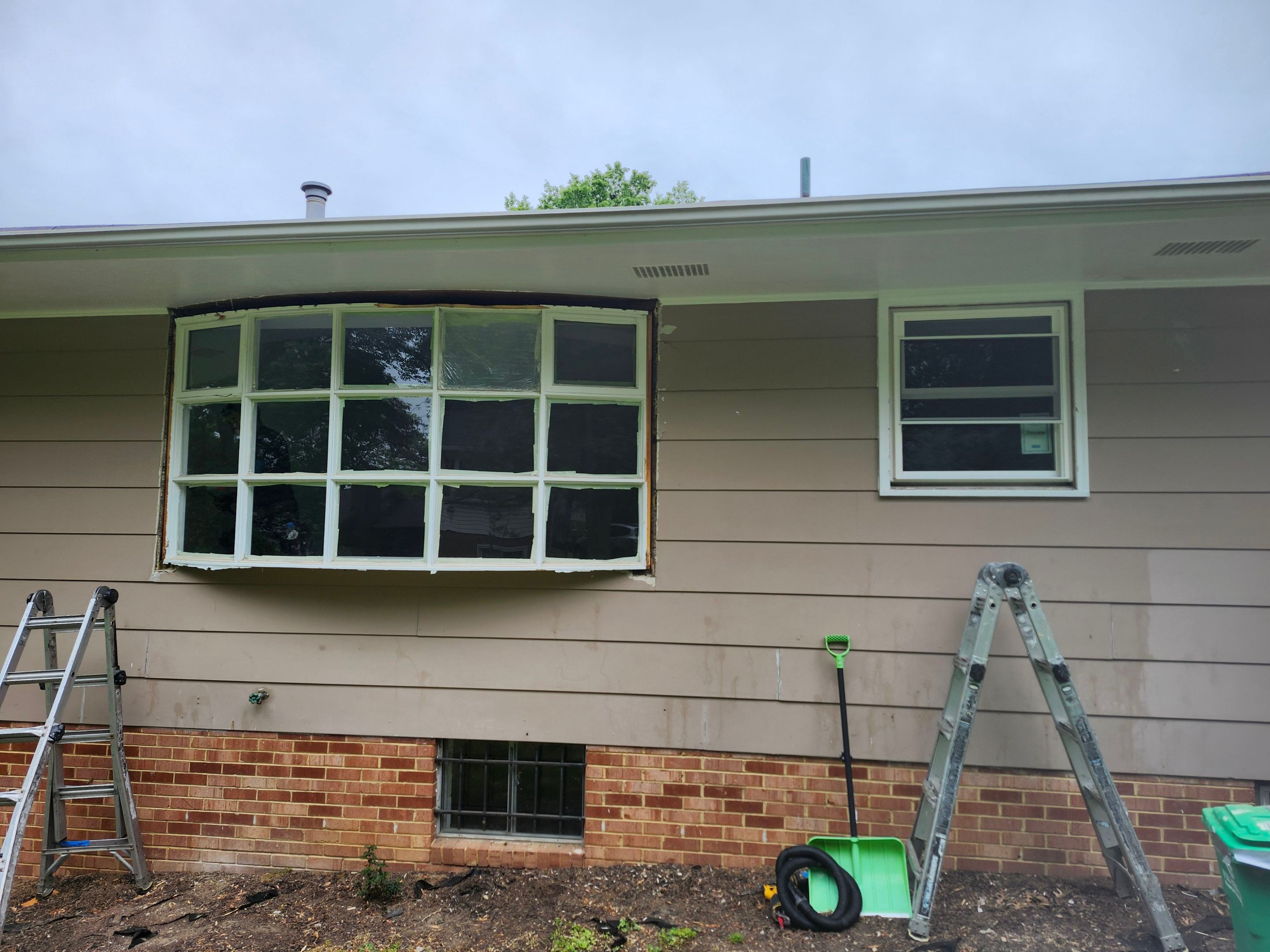 Bow window replacement with flat window by Window Depot of Annapolis