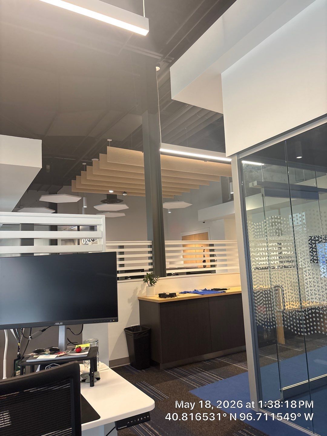 Modern Office Renovation in Lincoln Featuring Acoustic Ceilings and Glass Partitions by CompanyCam Sales Demo