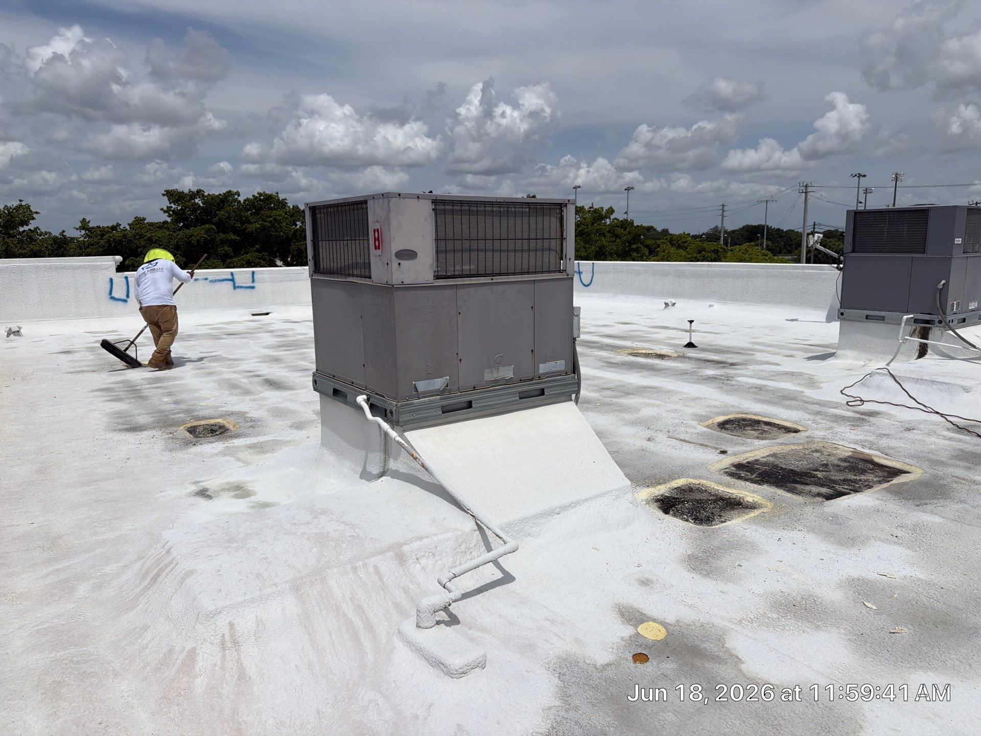 Commercial Flat Roof Restoration and Elastomeric Waterproofing in Delray Beach by Roof King LLC