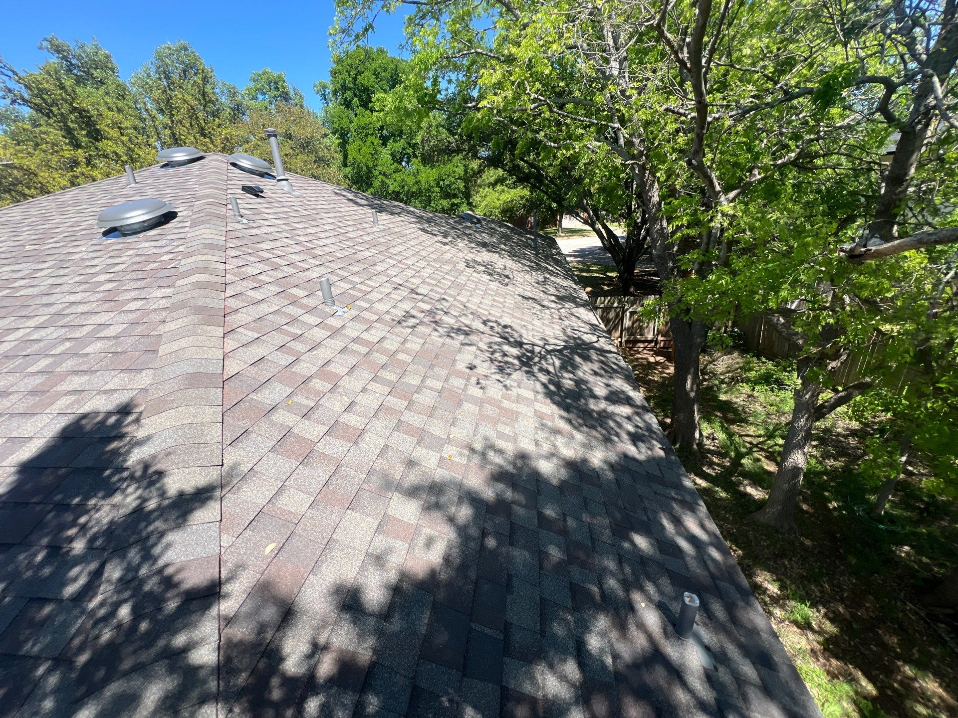 Rental property upgrade using CertainTeed Landmark shingles. by Oakwood Roofing and Construction, LLC