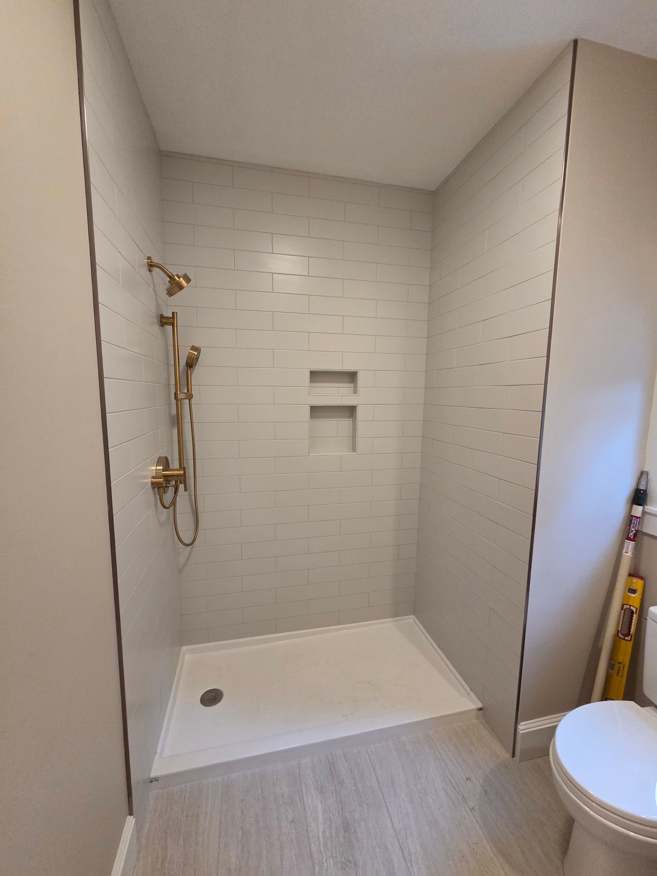 CRL Cambridge Series Dual Sliding Shower Enclosure — Installed in 3/8" Clear ShowerGuard Glass with Brushed Bronze Accents by Cheshire Glass Company
