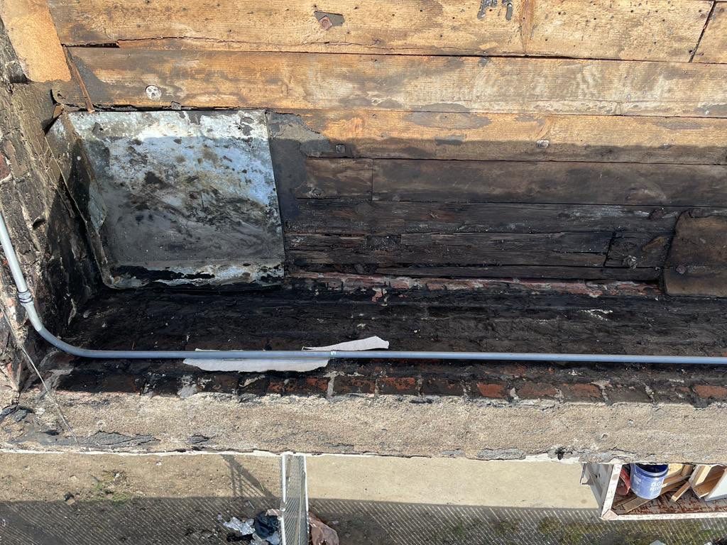 Commercial Roofing Installation using Conklin BenchPly system with PUMA top coat (imbedded fabric system) by Straight Edge Roofing Inc