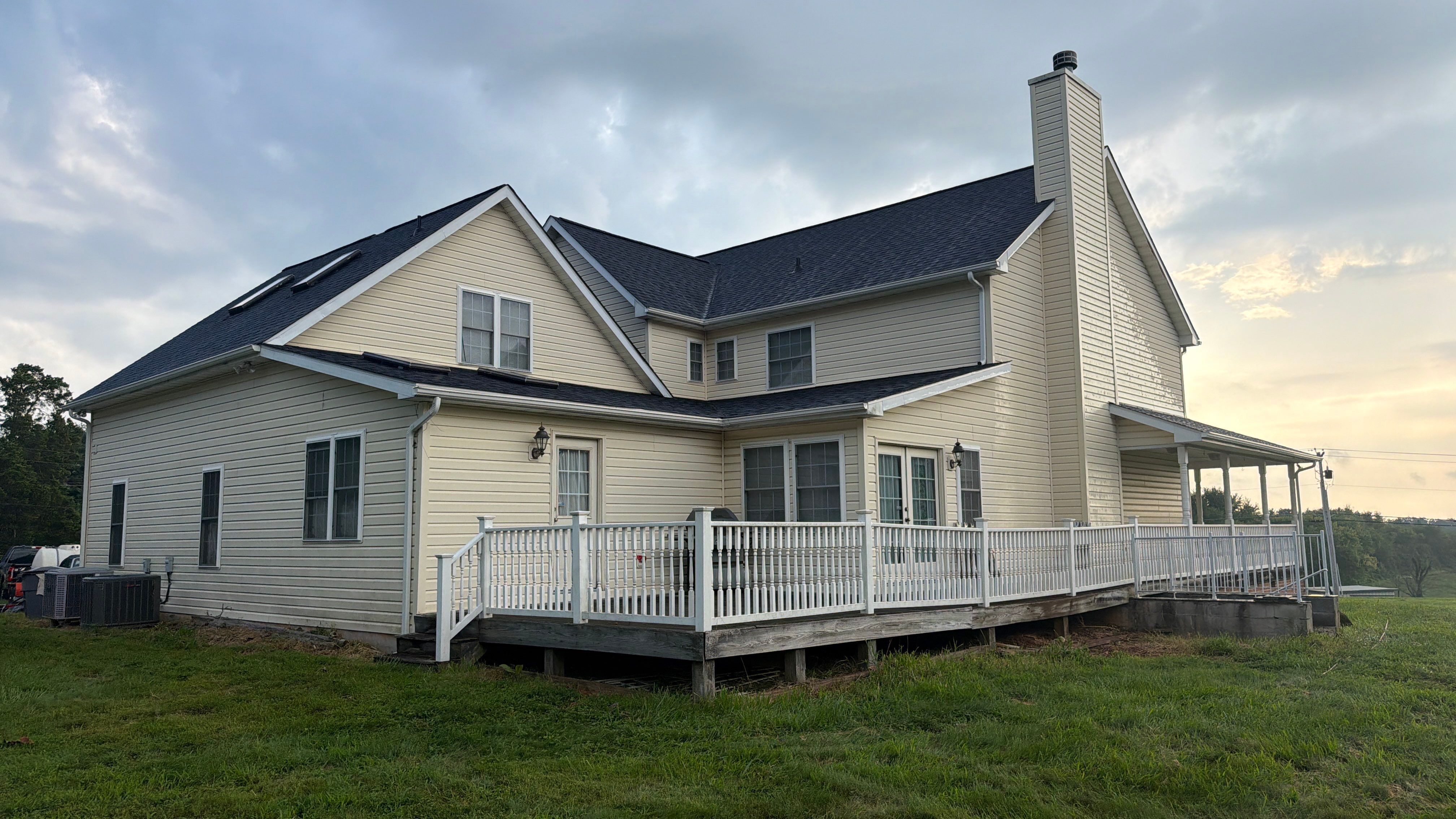 Vinyl Siding House Washing and Wood Deck Restoration in Carroll County by Baltimore Pressure Washers Inc.