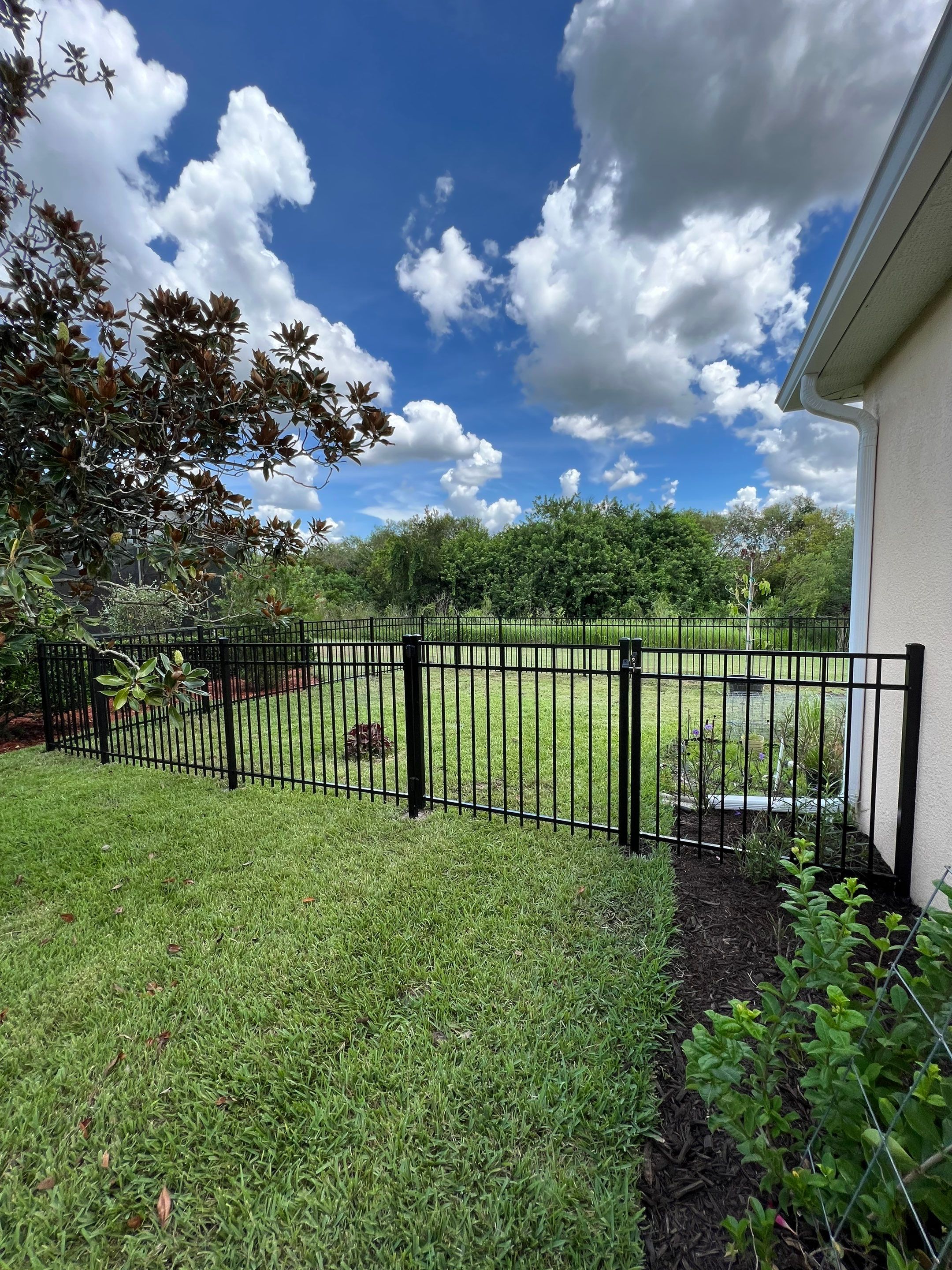 Black Aluminum Fence Installation in Bradenton, FL by Asap fence and gates, LLC