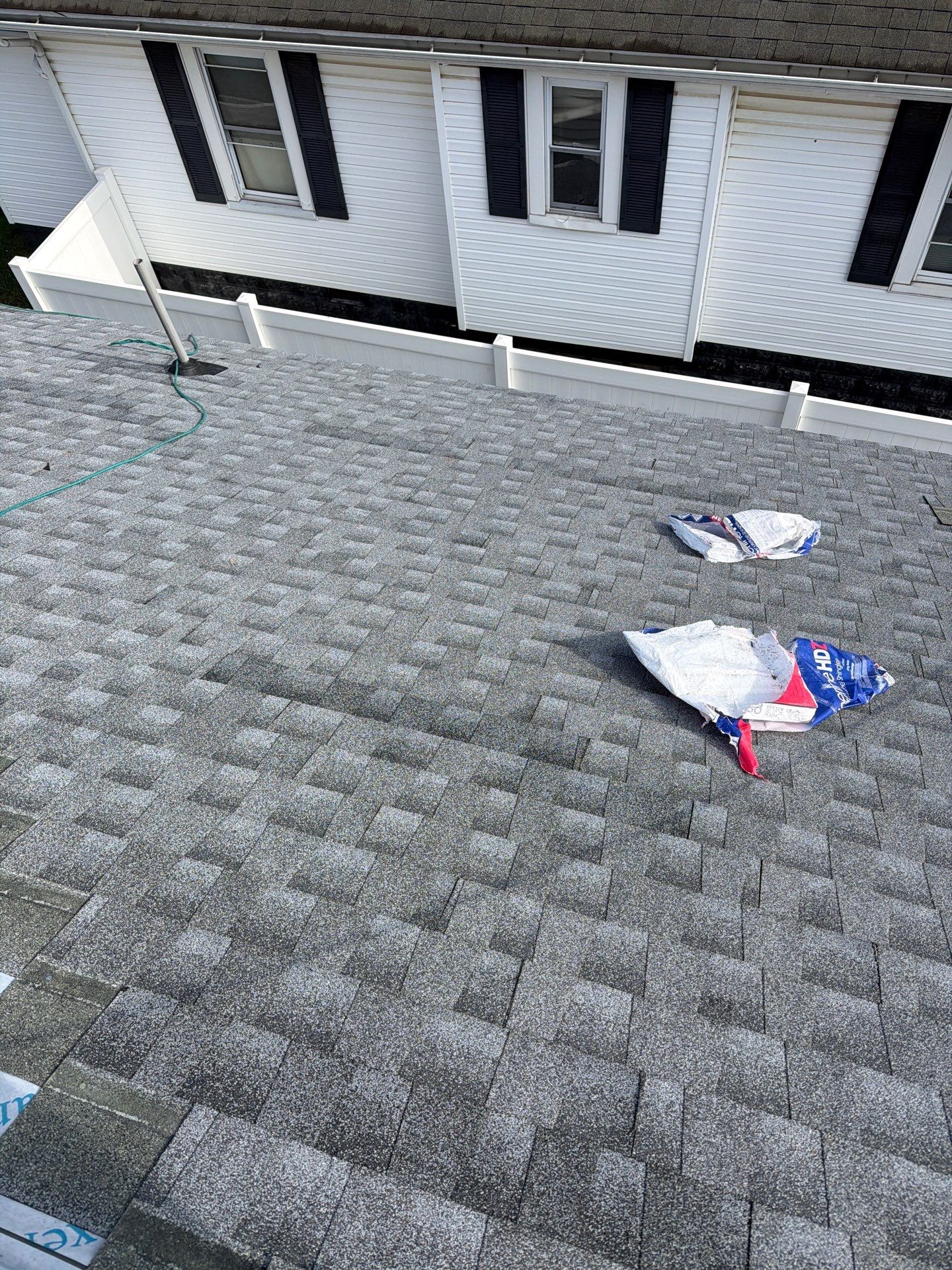 Residential Roofing Installation using GAF Timberline HDZ Oyster Grey by Rainstoppers Roofing