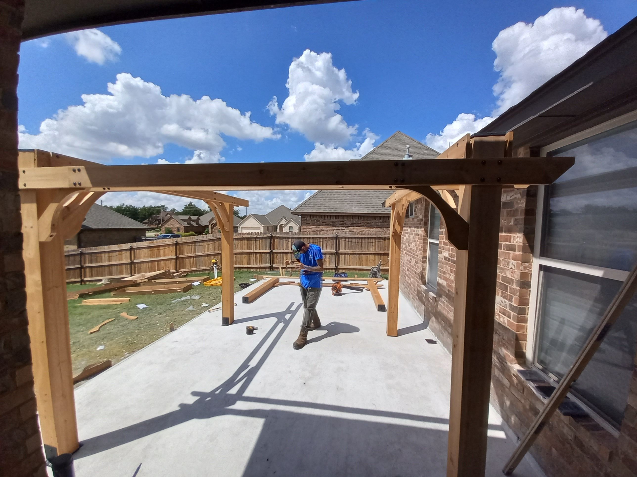 Concrete slab with Pergola by Clays Services Inc