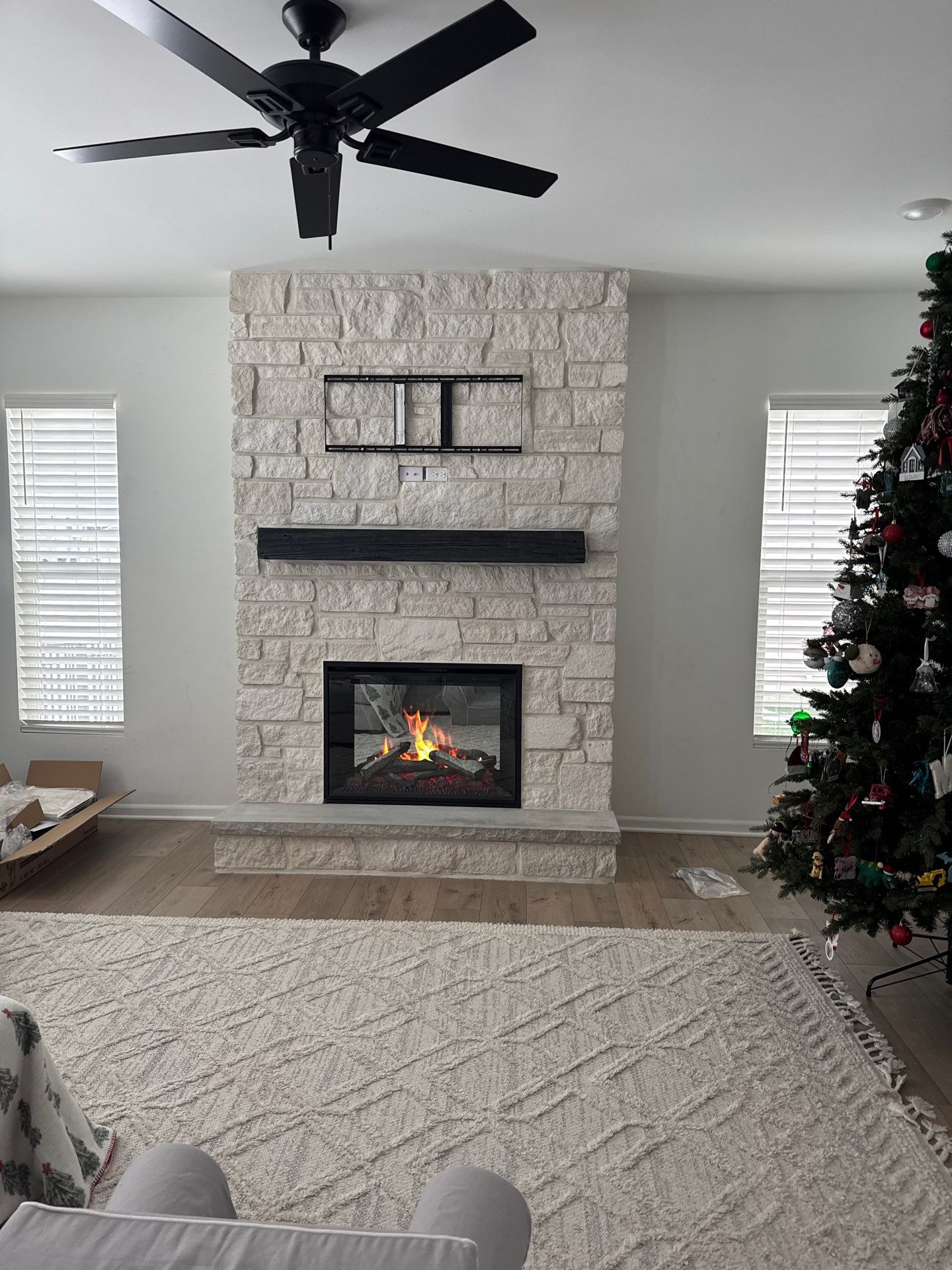 Electric Fireplace & Stone Veneer Installation by Leonard and Sons Building Services, Inc.