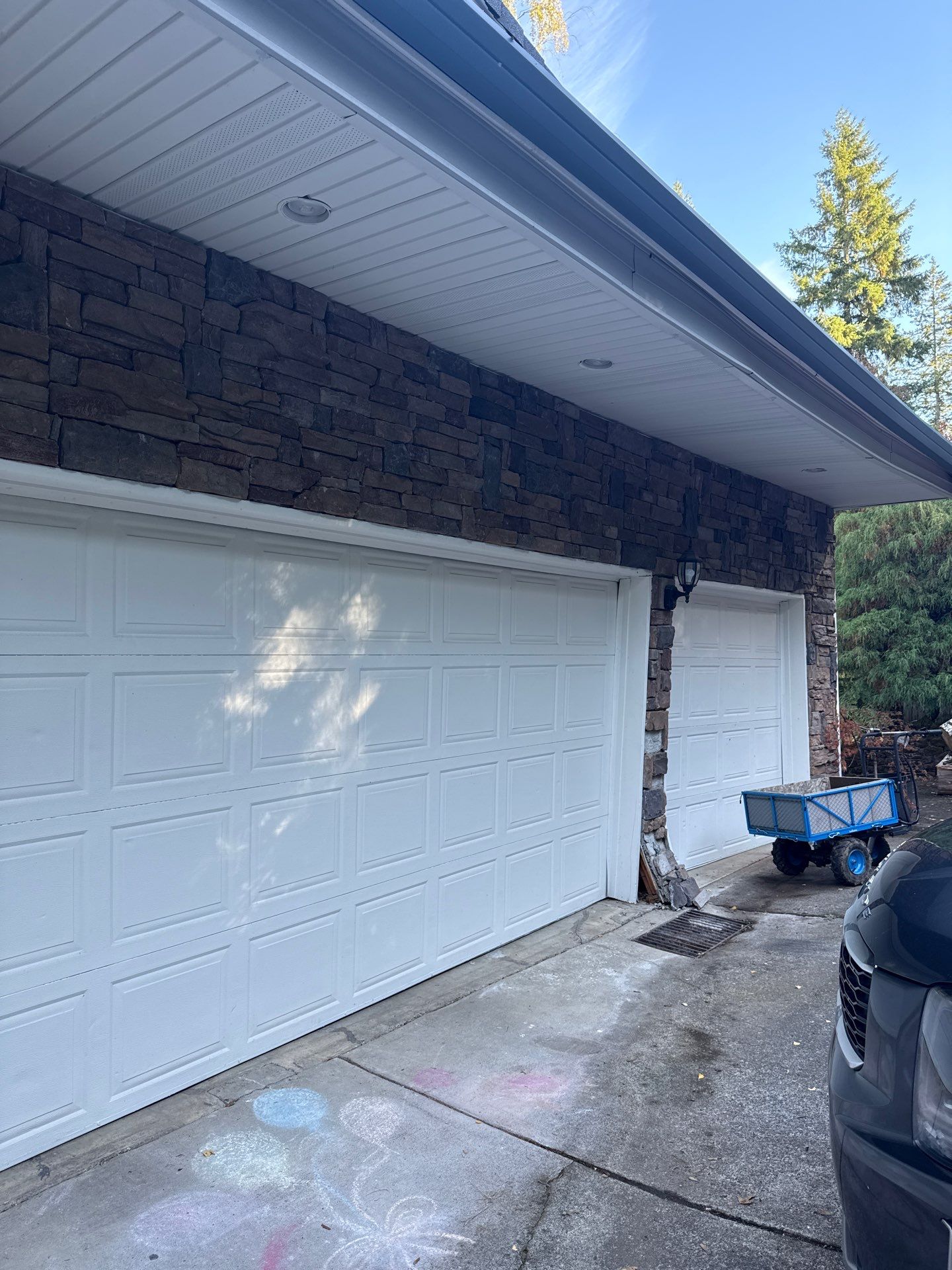 Damascus Garage Exterior Repair and Stacked Stone Veneer Installation by American Made Construction 