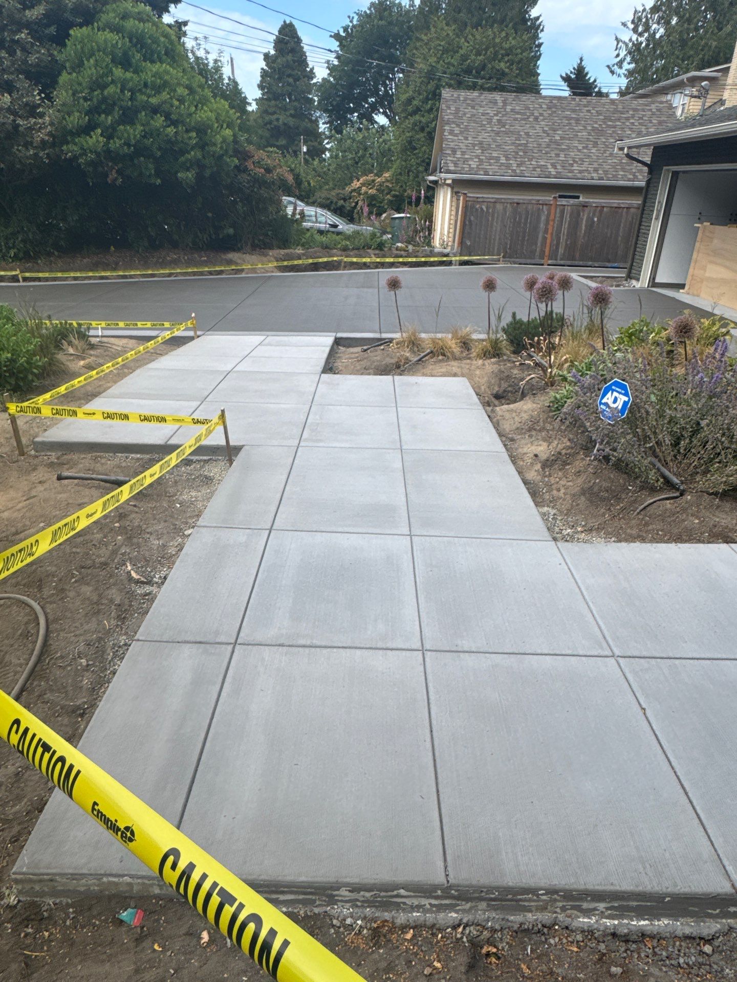 Concrete Driveway Makeover | Edmonds  by Jireh Asphalt & Concrete Inc 