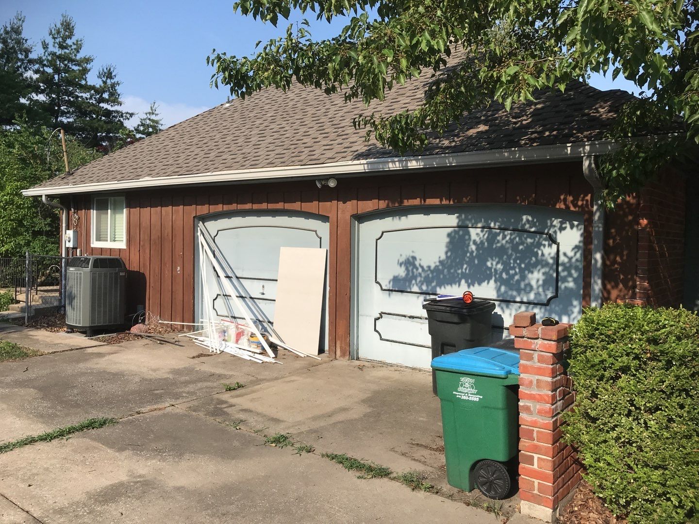 New white siding with Black trim by EEC  Windows, Siding & Roofing 