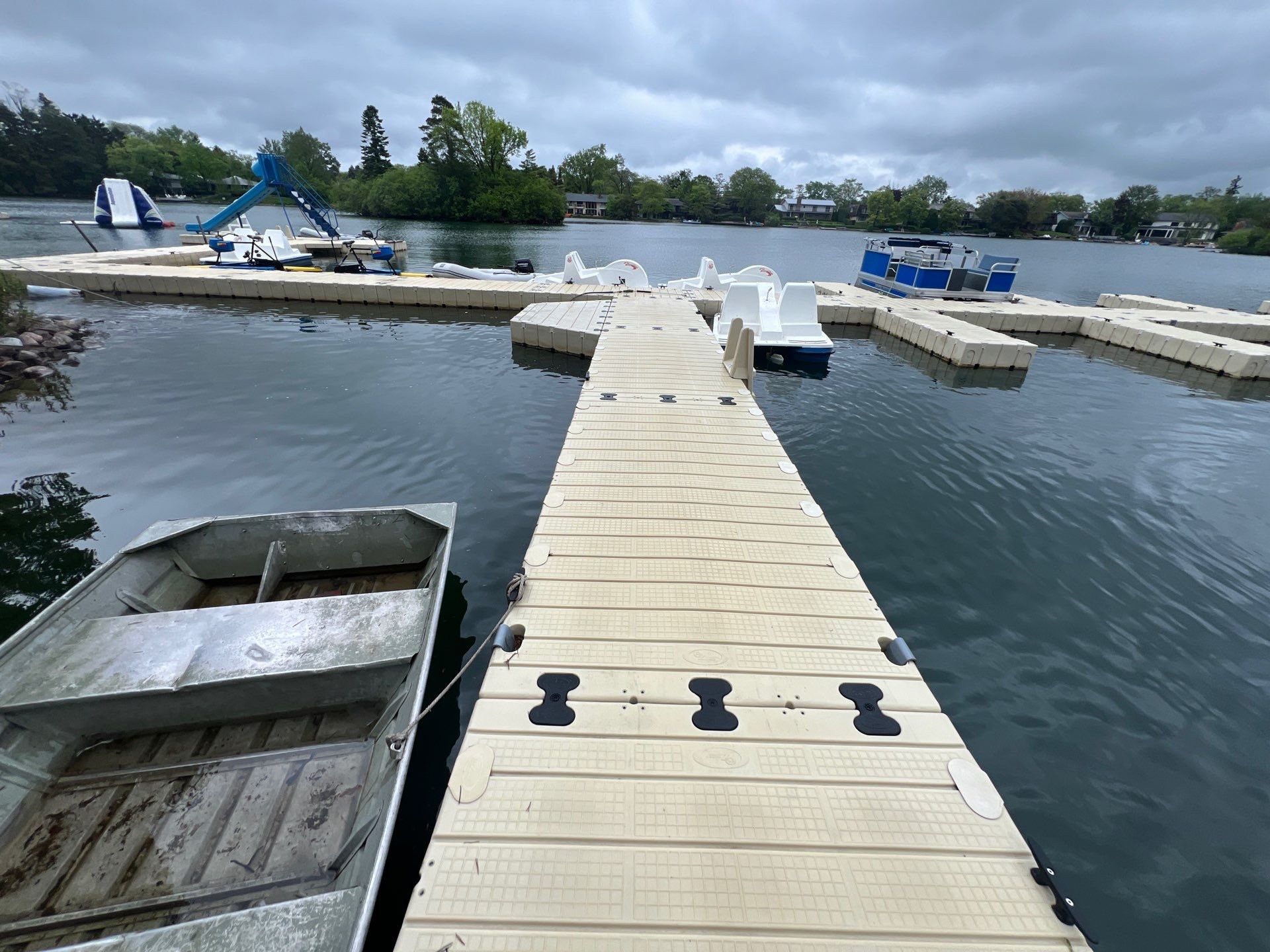 Power washing of floating dock by Northern Power Washing LLC.