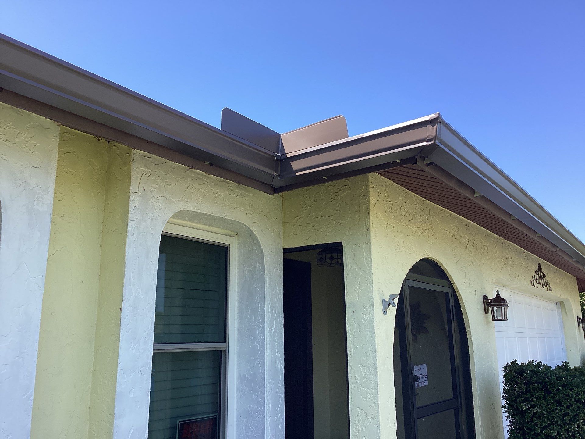 Musket Brown Seamless Gutters using 6 Inch Seamless Gutters in Cape Coral FL by Gutter Professors