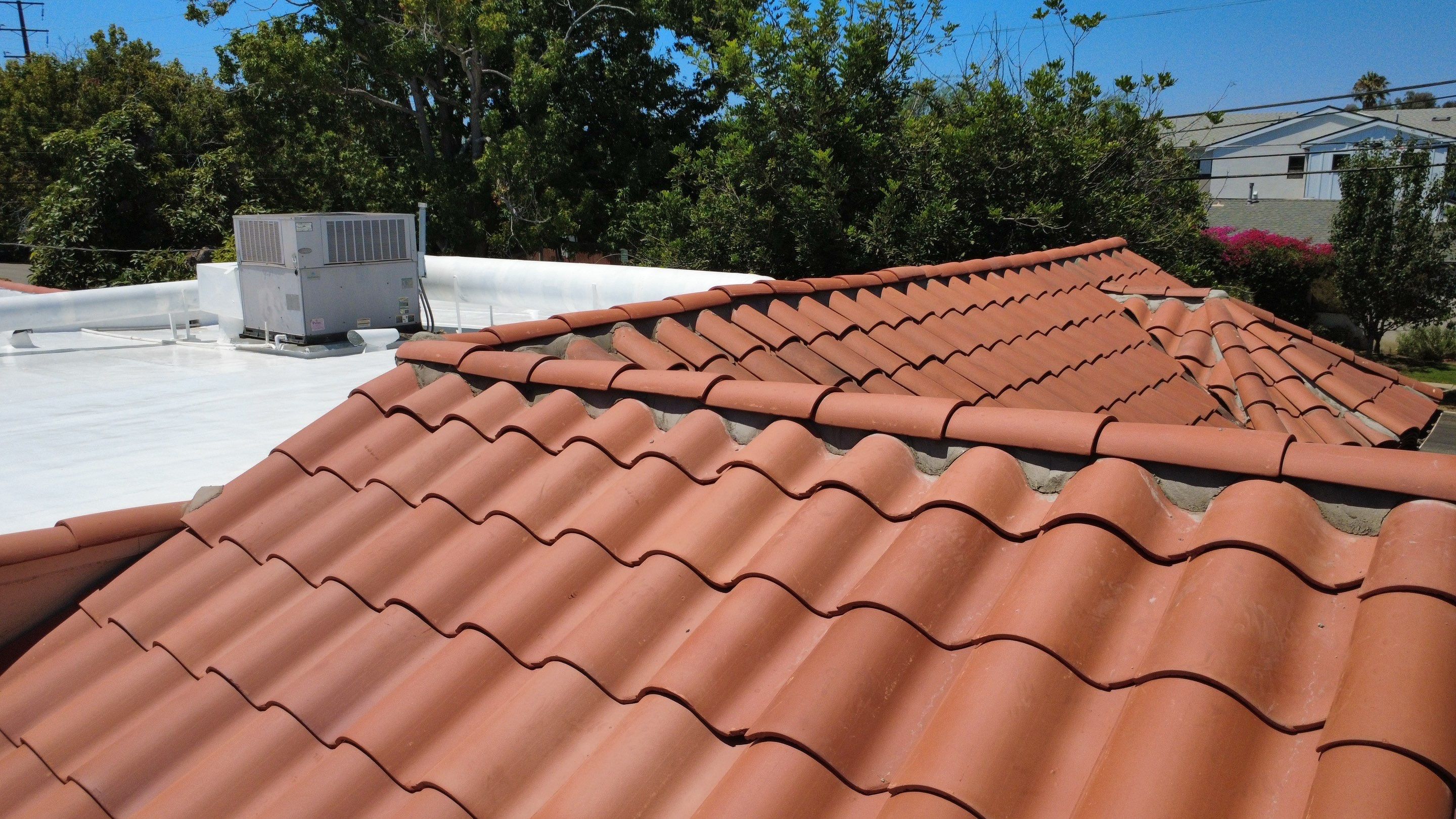 Tile Reset and Silicone Membrane Installation by Hull Brothers Roofing
