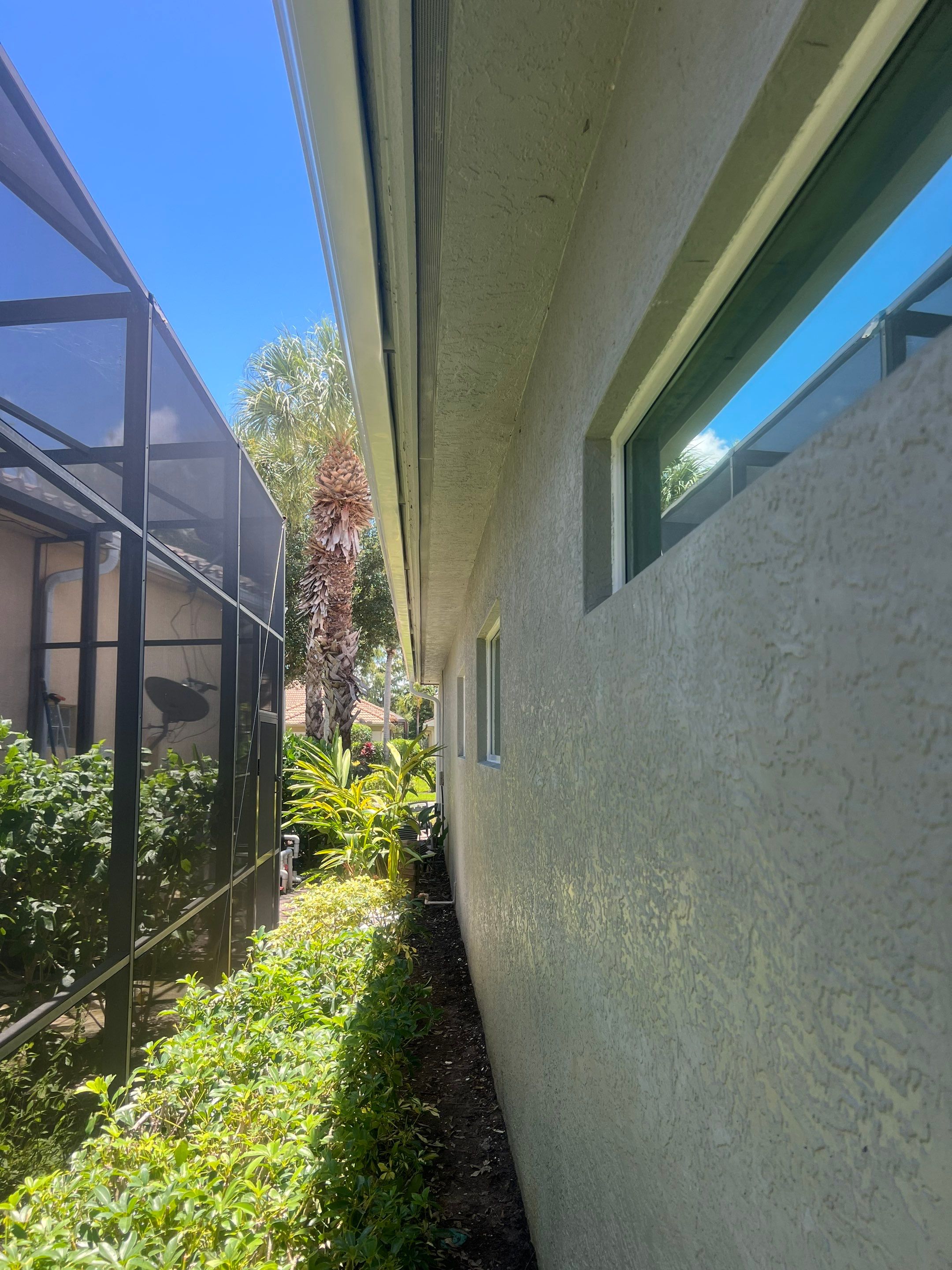 6 Inch Seamless Gutters and Downspout Installation in Naples FL by Gutter Professors