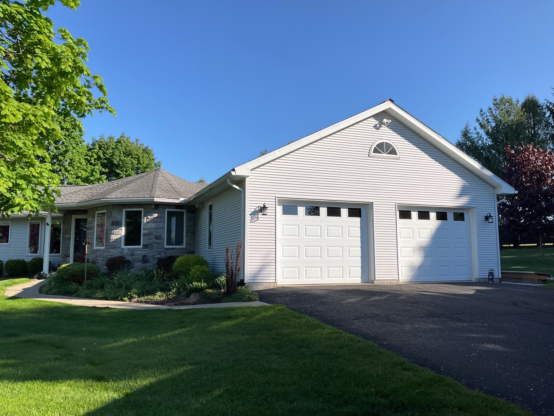 Nightfall Exterior Siding Replacement and Stone Veneer in Halifax by Esh Builders