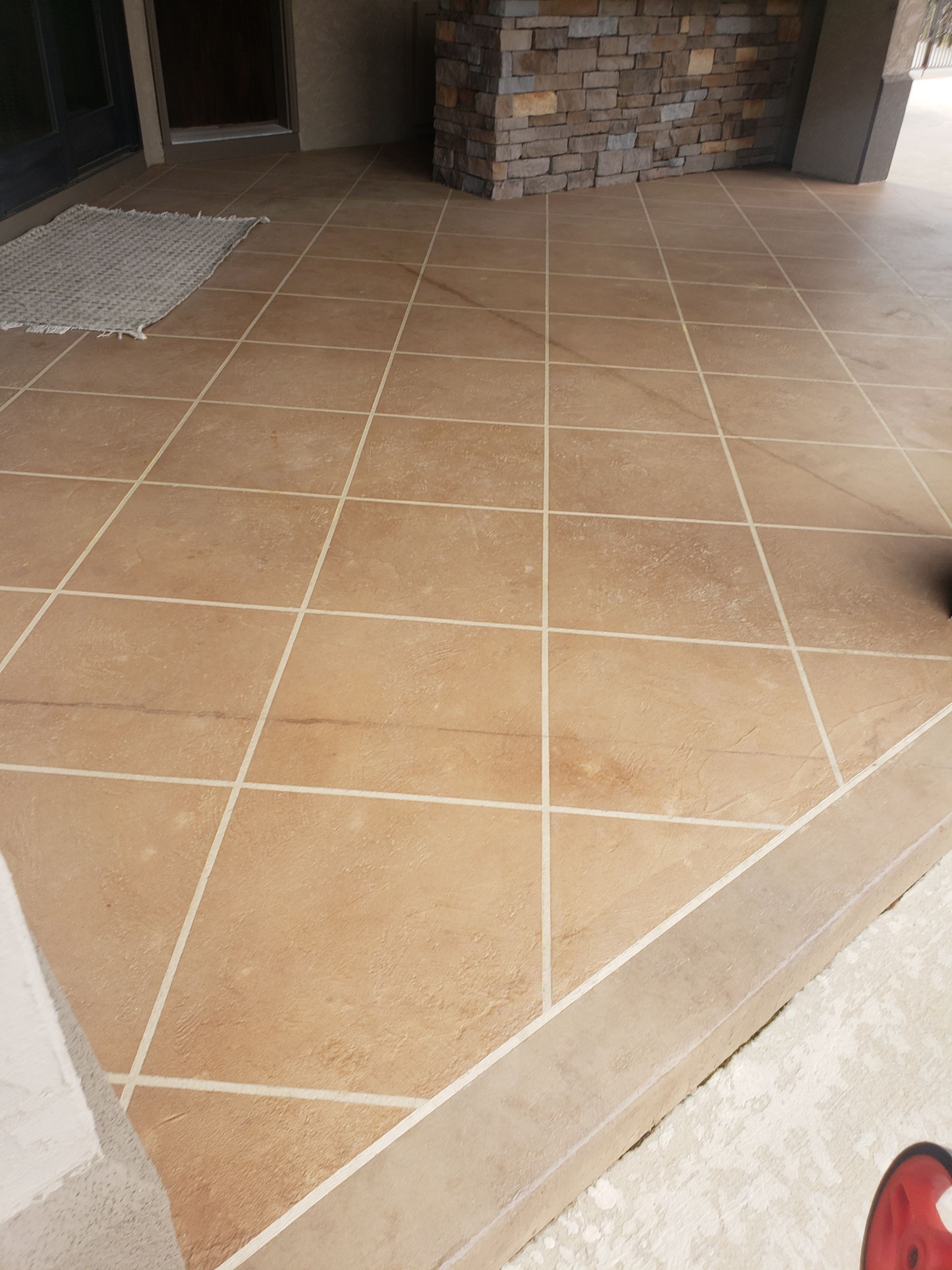 Lake Lotawana -- Front Walkway and Back Patio Tuscan Overlay by Big Red Decorative Concrete, LLC