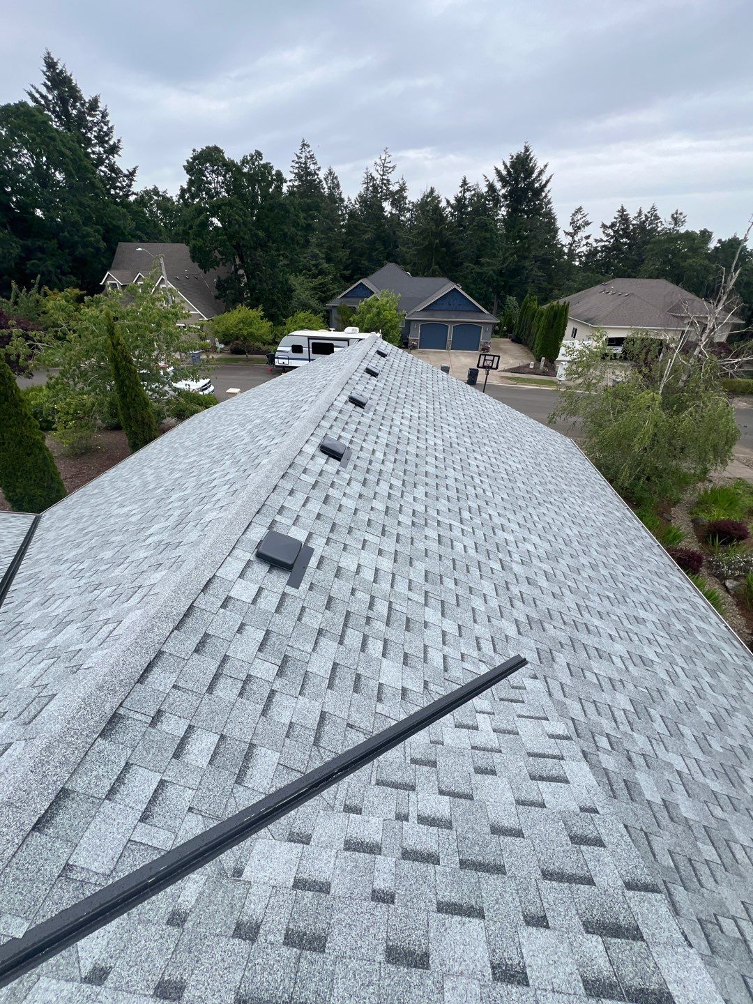 Residential Roofing Installation using IKO Cambridge (Color: Dual Grey) by Orezona Building & Roofing Company, Inc.