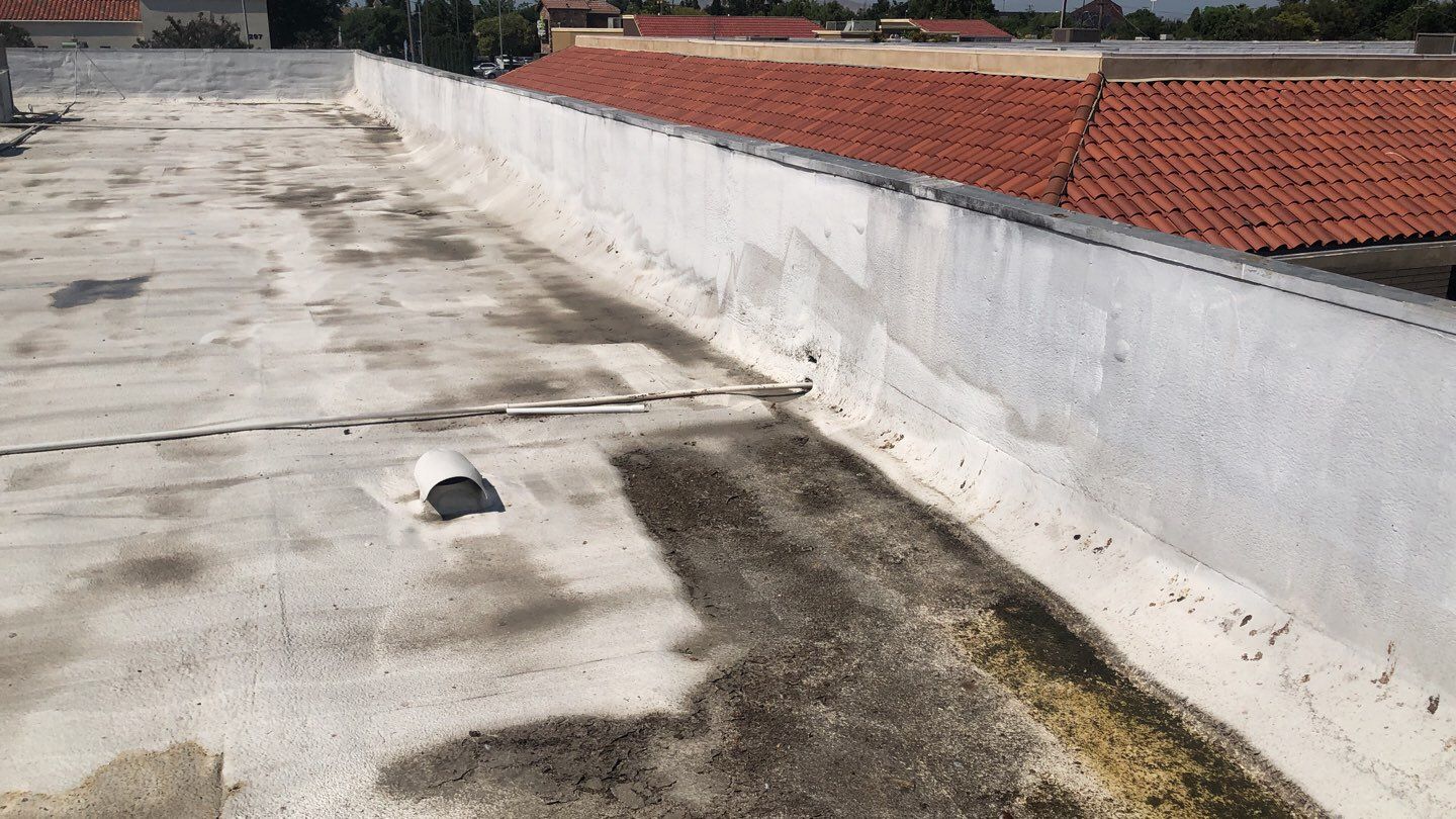 Reburbish existing spray foam job by Straight Edge Roofing Inc