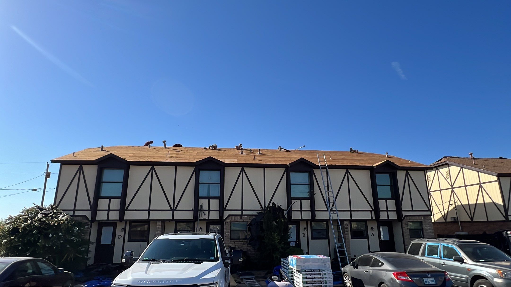 Commercial Roofing Installation using ATLAS Pinnacle Pristine Shingles by Harvey Roofing & Construction