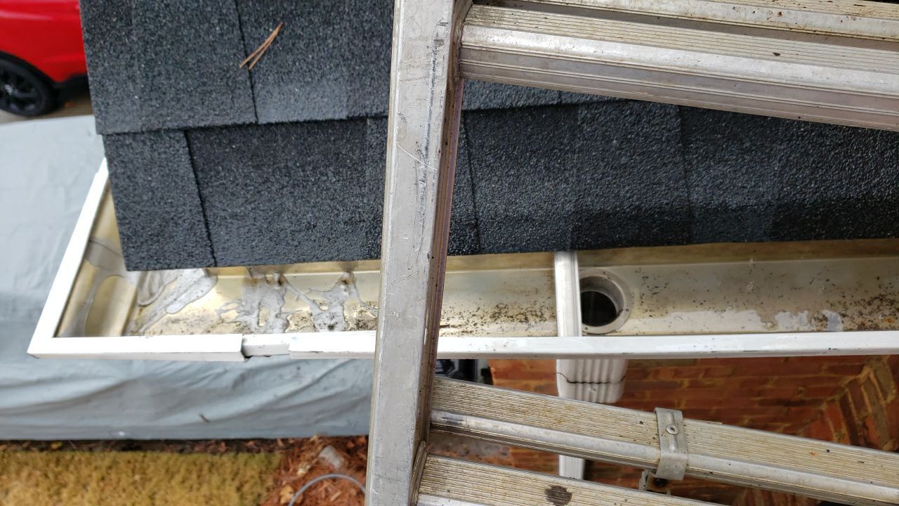Gutter Cleaning using water by Power Wash Masters LLC