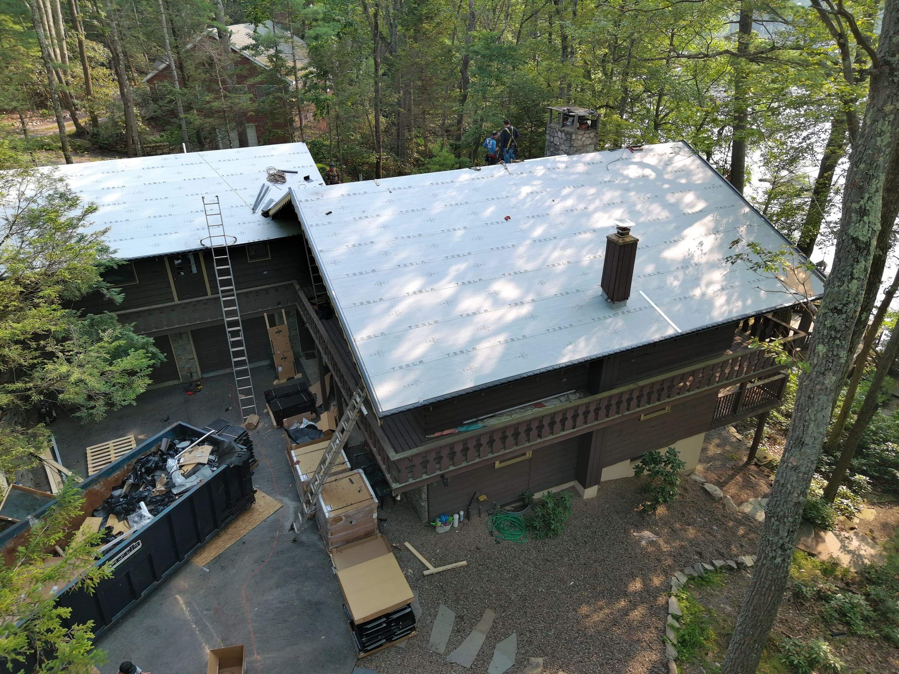 Stunning Tesla Solar Roof Cabin in the Woods by American Home Contractors