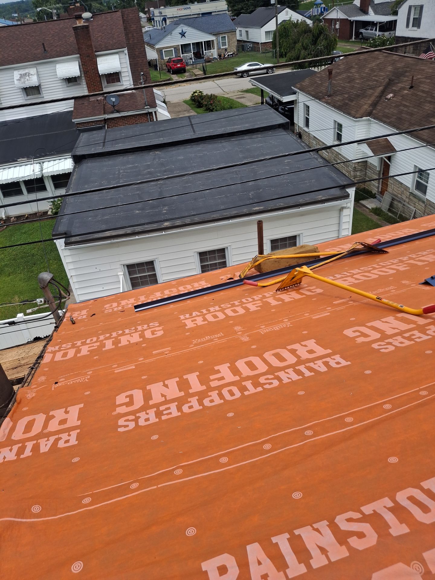Residential Roofing Installation using Metal by Rainstoppers Roofing