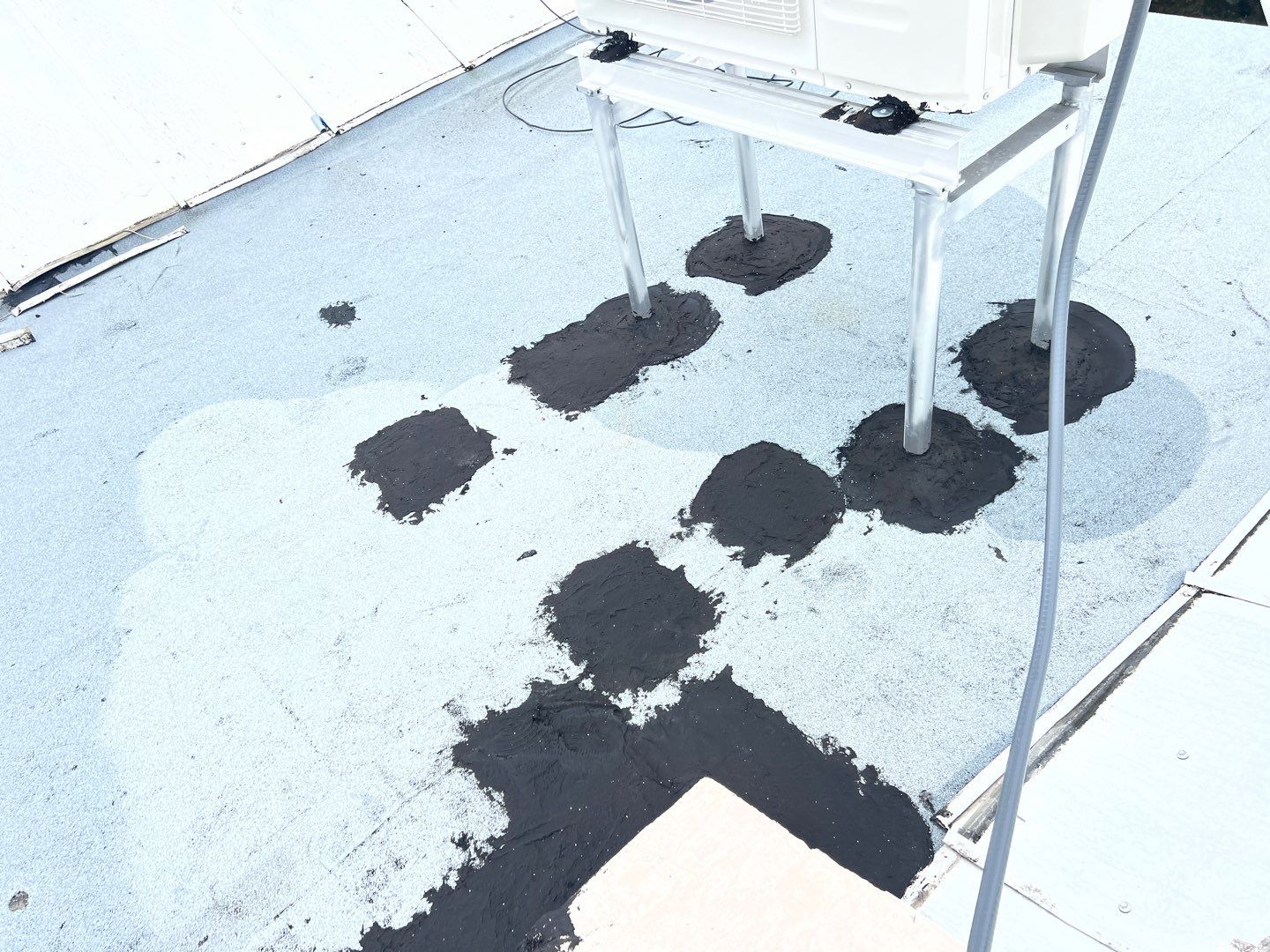 Commercial Roofing Repair using Roof Sealant by Four Peaks Roofing