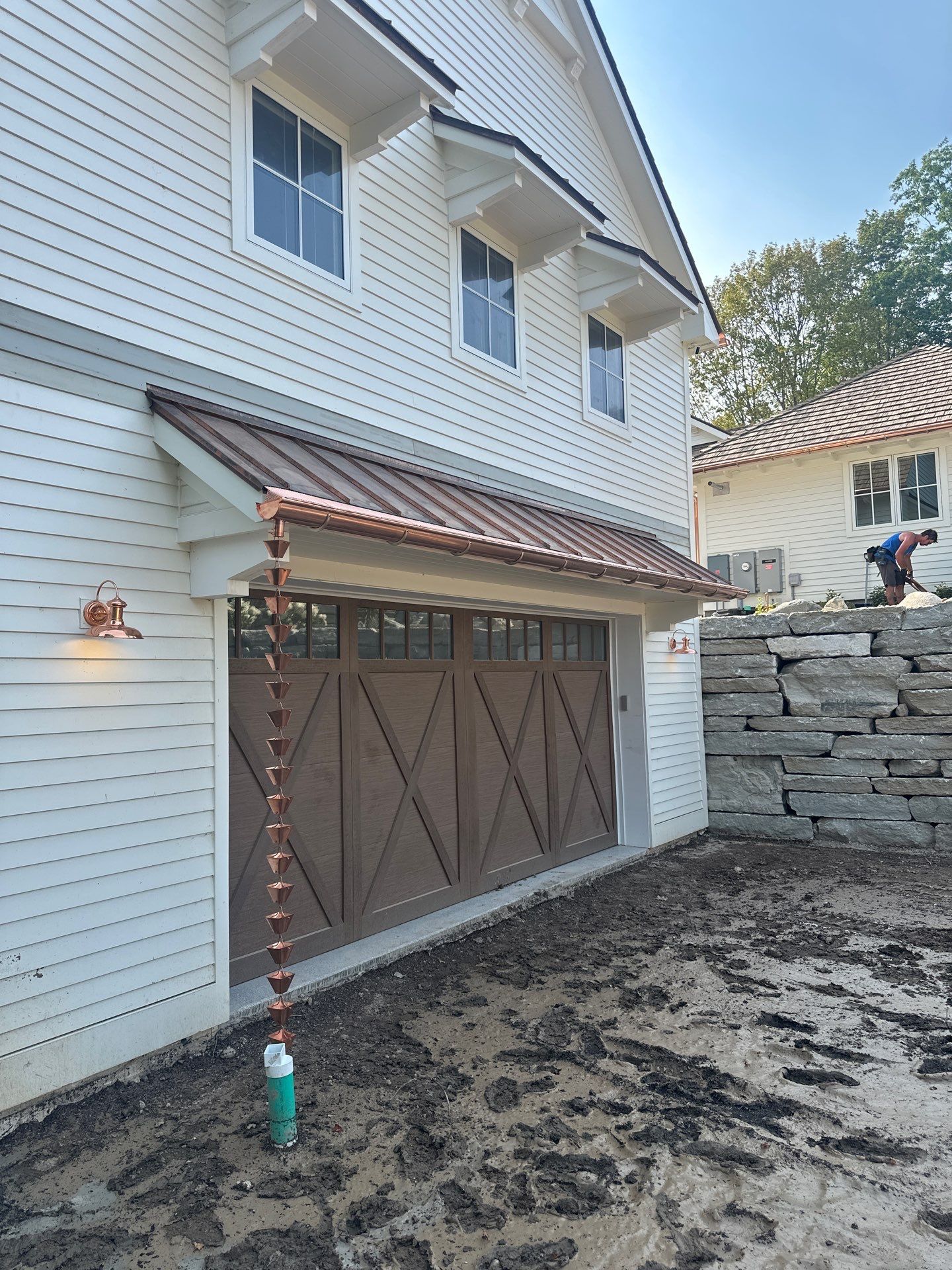 Custom Copper Gutter System and Accent Roofing in East Jordan by Rainbow Seamless Systems