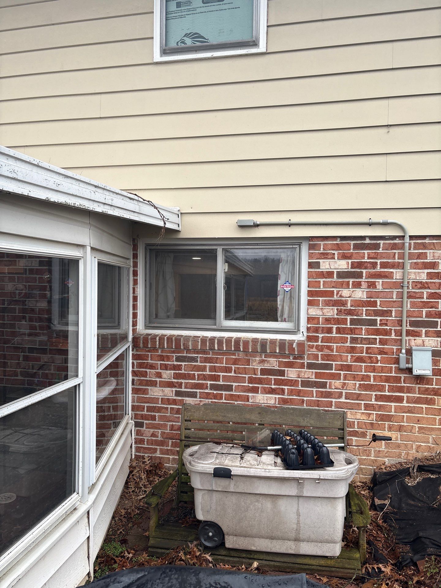 Storm Door and Basement Windows by Aspen Home Improvements