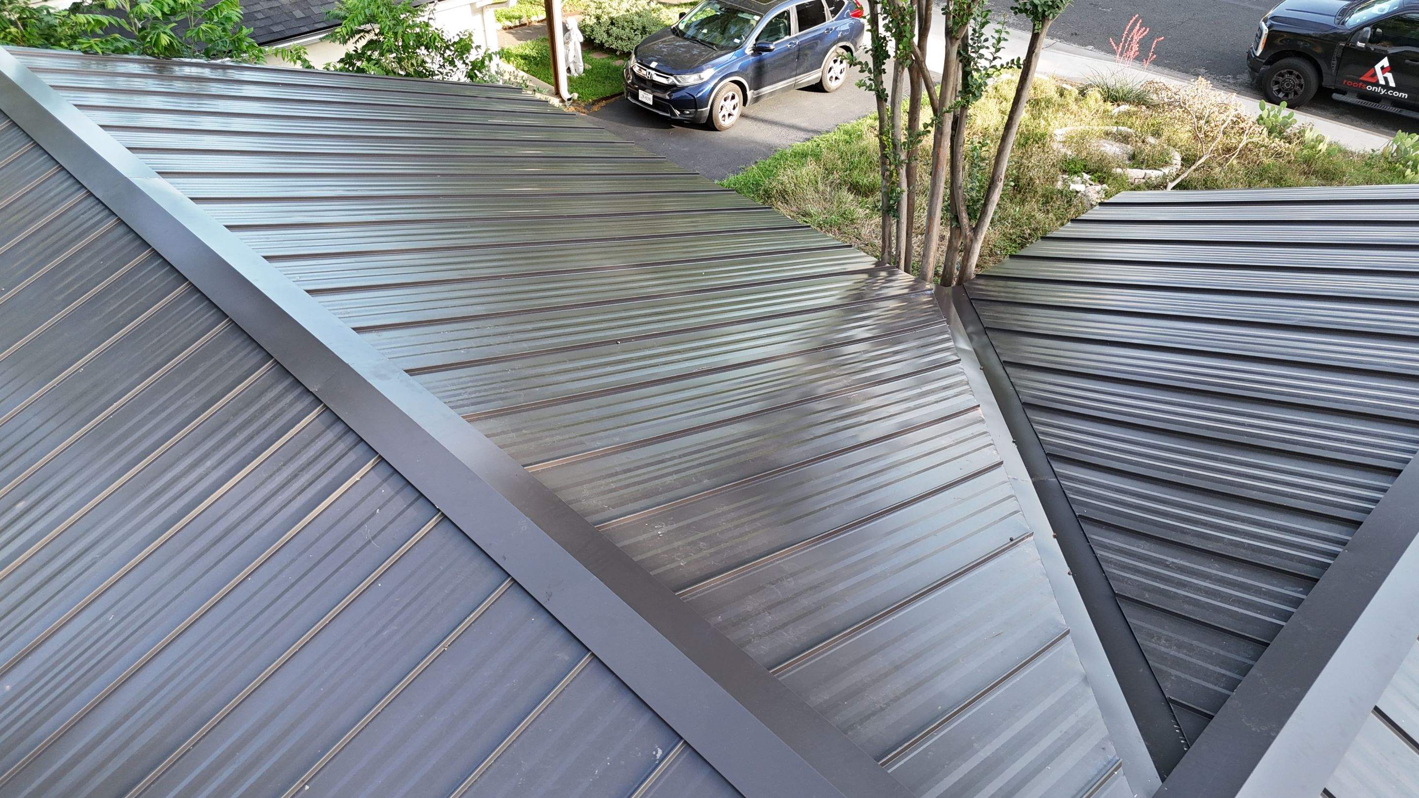 Dark Bronze - L&A Standing Seam with Striations by RoofsOnly.com