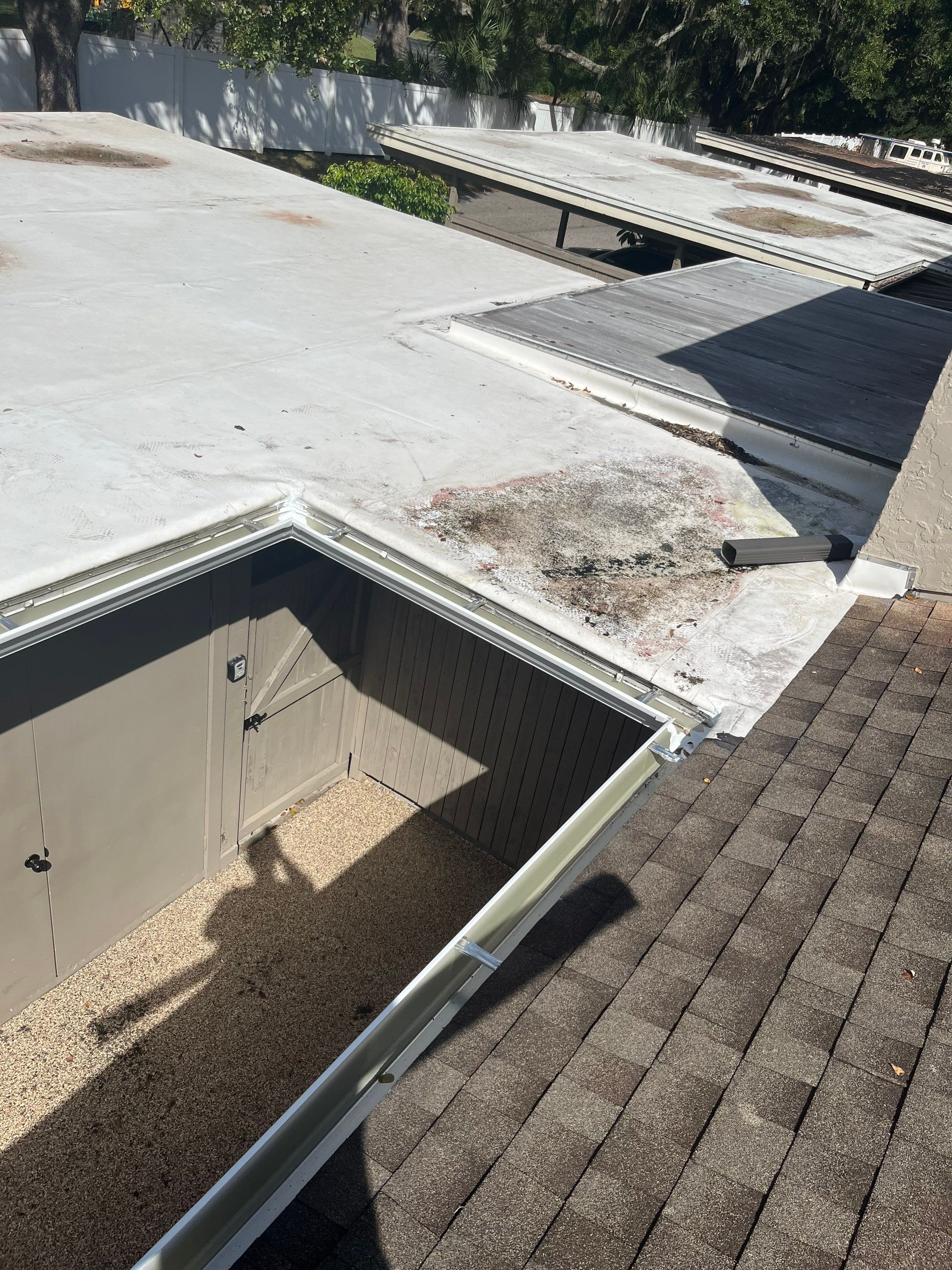 Professional Downspout Installation in Tampa, FL by Gutter Professor by Gutter Professors