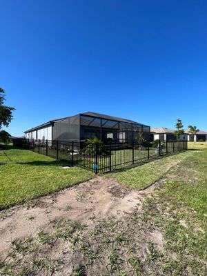 Aluminum Fence Installation using Black 3 Rail Aluminum Fence