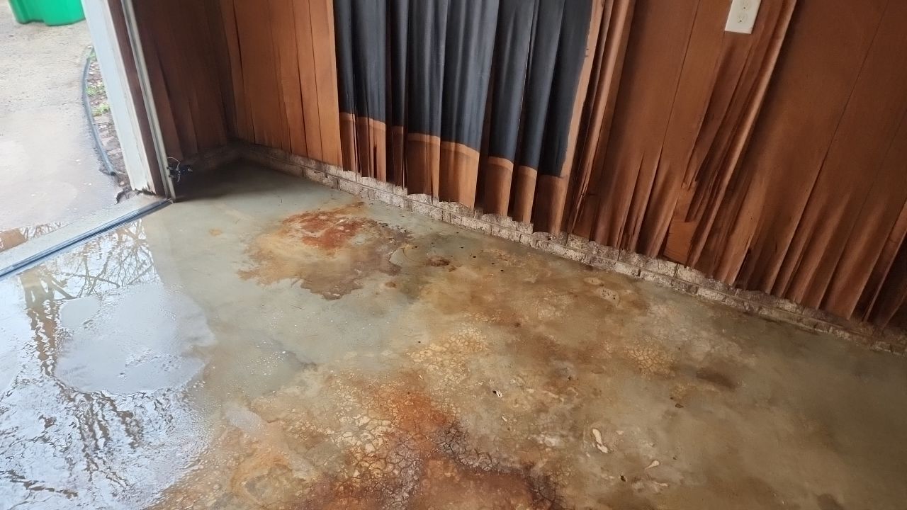 garage floor clean using cleaner by G&H Home Tech Pros LLC